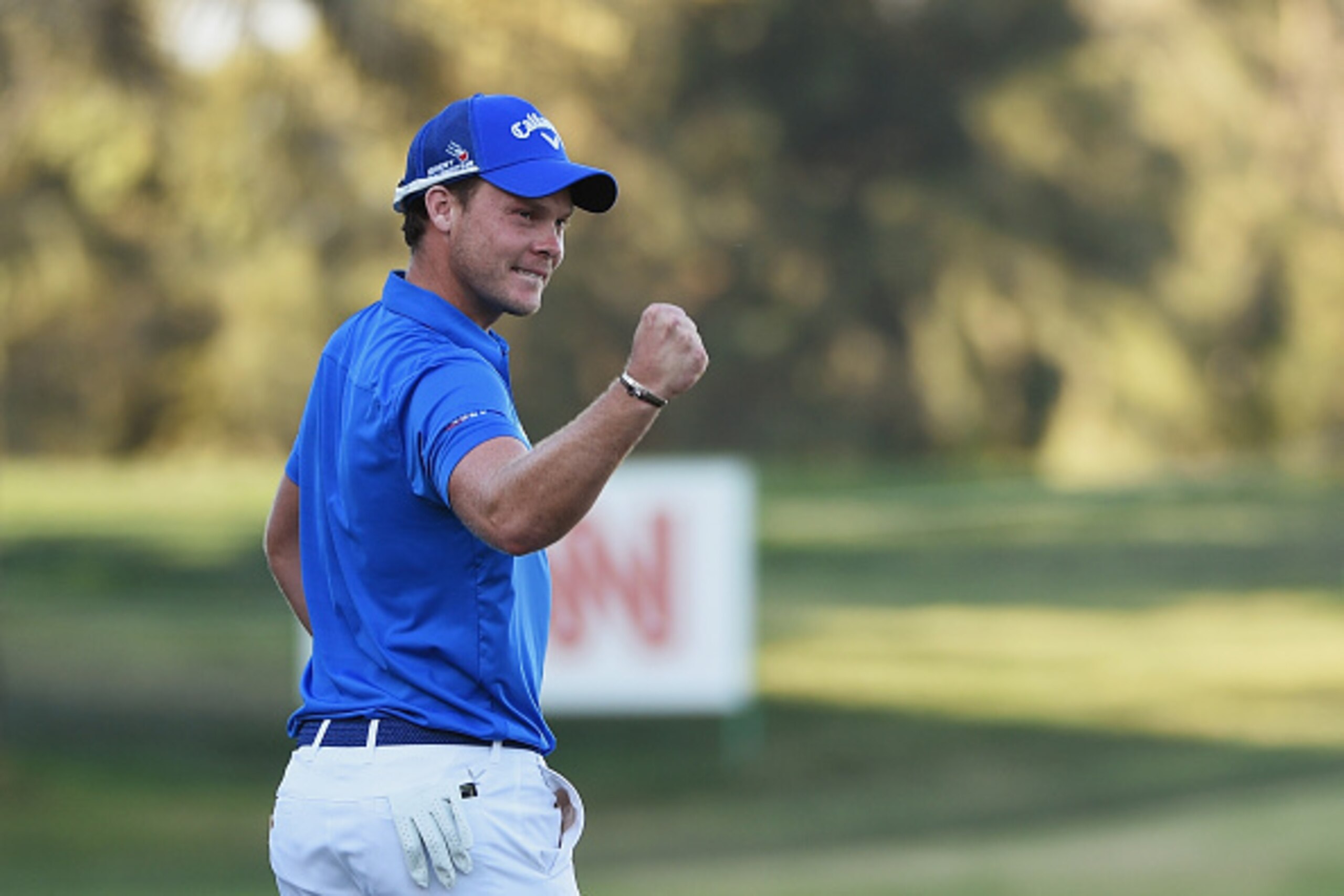 DUBAI, UNITED ARAB EMIRATES - FEBRUARY 07: Danny Willett of England celebrates his victory on the 18th green during the final round of the Omega Dubai Desert Classic at the Emirates Golf Club on February 7, 2016 in Dubai, United Arab Emirates. (Photo by DUBAI, UNITED ARAB EMIRATES - FEBRUARY 07: Danny Willett of England celebrates his victory on the 18th green during the final round of the Omega Dubai Desert Classic at the Emirates Golf Club on February 7, 2016 in Dubai, United Arab Emirates. (Photo by
