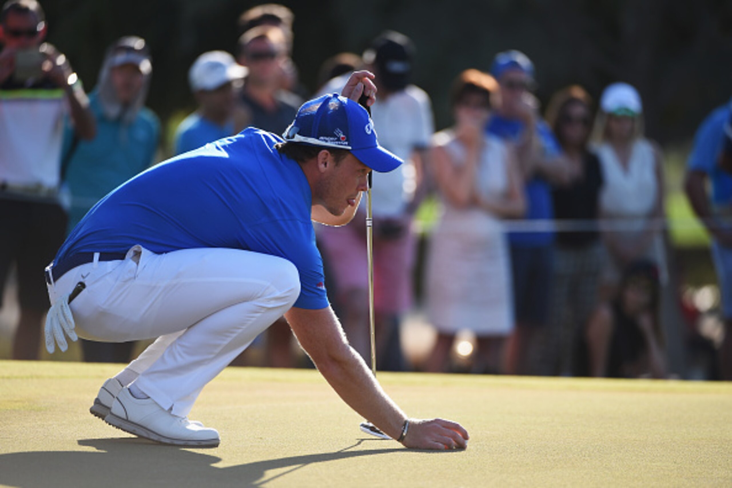DUBAI, UNITED ARAB EMIRATES - FEBRUARY 07: Danny Willett of England lines up a putt on the 17th green during the final round of the Omega Dubai Desert Classic at the Emirates Golf Club on February 7, 2016 in Dubai, United Arab Emirates. (Photo by Ross K DUBAI, UNITED ARAB EMIRATES - FEBRUARY 07: Danny Willett of England lines up a putt on the 17th green during the final round of the Omega Dubai Desert Classic at the Emirates Golf Club on February 7, 2016 in Dubai, United Arab Emirates. (Photo by Ross K