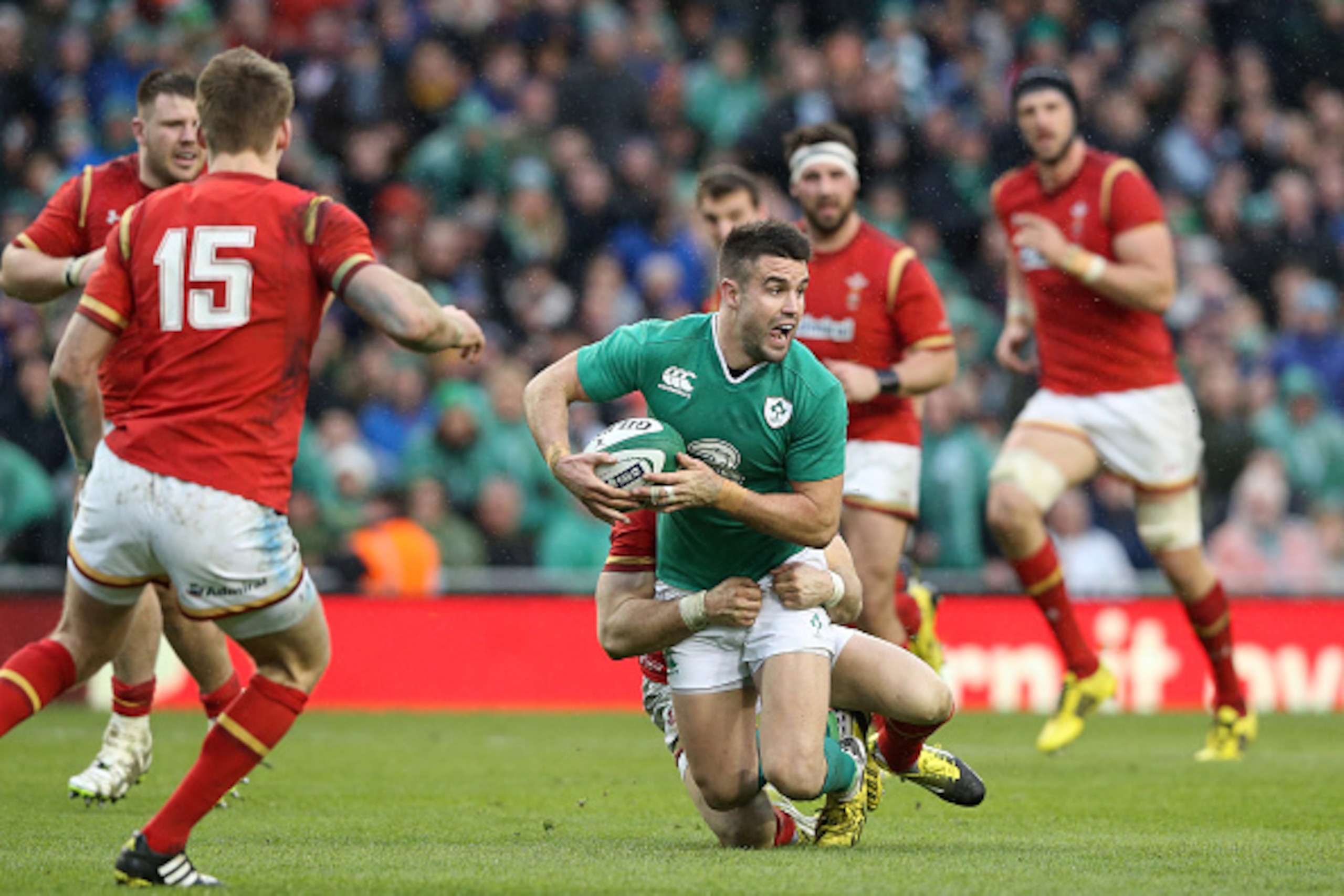 DUBLIN, IRELAND - FEBRUARY 07:  Conor Murray of Ireland is tackled during the RBS Six Nations match between Ireland and Wales at the Aviva Stadium  on February 7, 2016 in Dublin, Ireland.  (Photo by David Rogers/Getty Images)