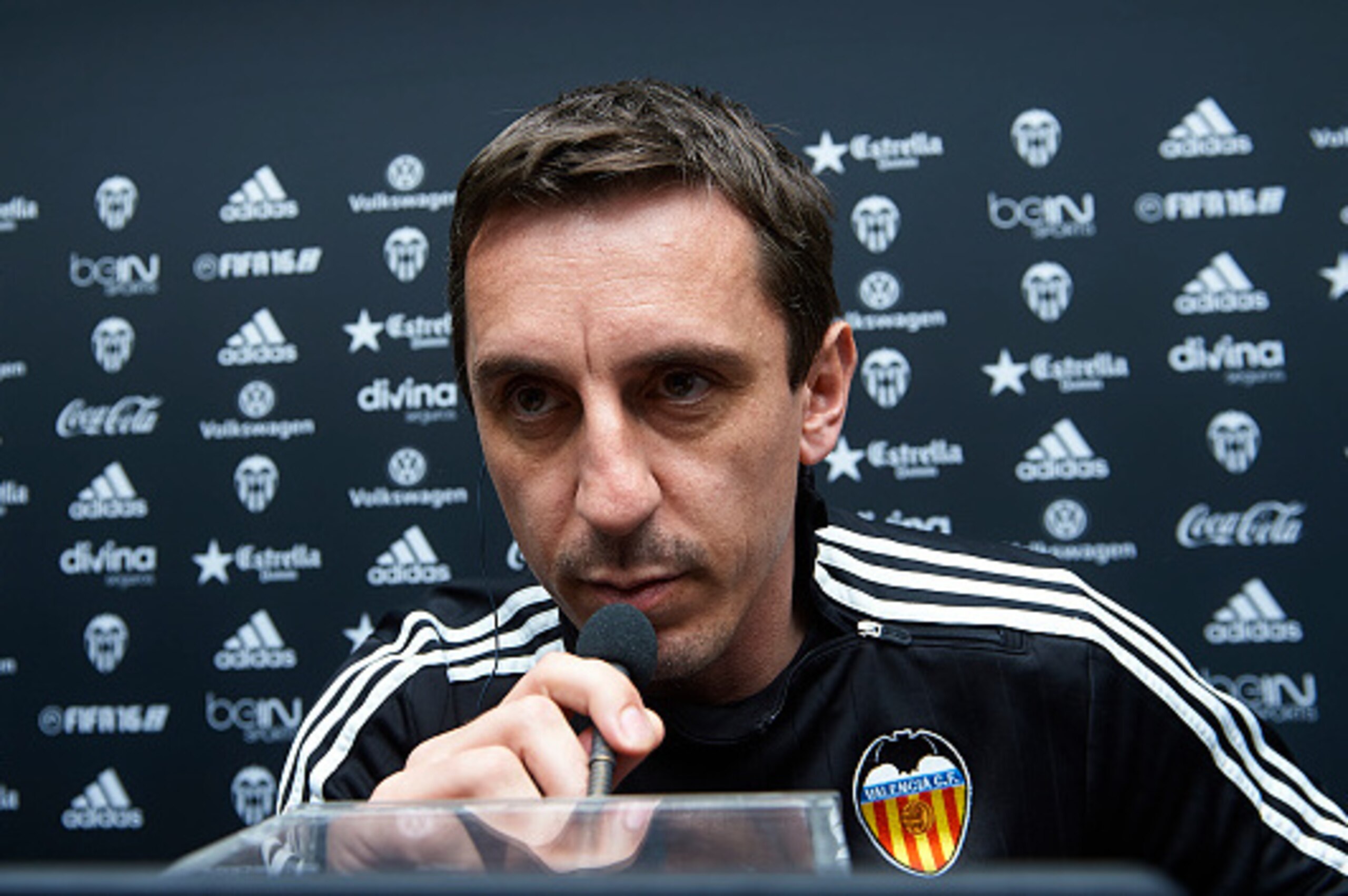 BARCELONA, SPAIN - FEBRUARY 02:  Gary Neville manager of Valencia CF faces the media during a press conference on the eve of the Spanish Copa del Rey semi-final football match between FC Barcelona and Valencia CF at Paterna Training Centre on February 2, 