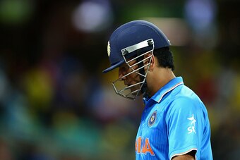 SYDNEY, AUSTRALIA - MARCH 26:  MS Dhoni of India leaves the ground after being run out by Glenn Maxwell of Australia during the 2015 Cricket World Cup Semi Final match between Australia and India at Sydney Cricket Ground on March 26, 2015 in Sydney, Austr