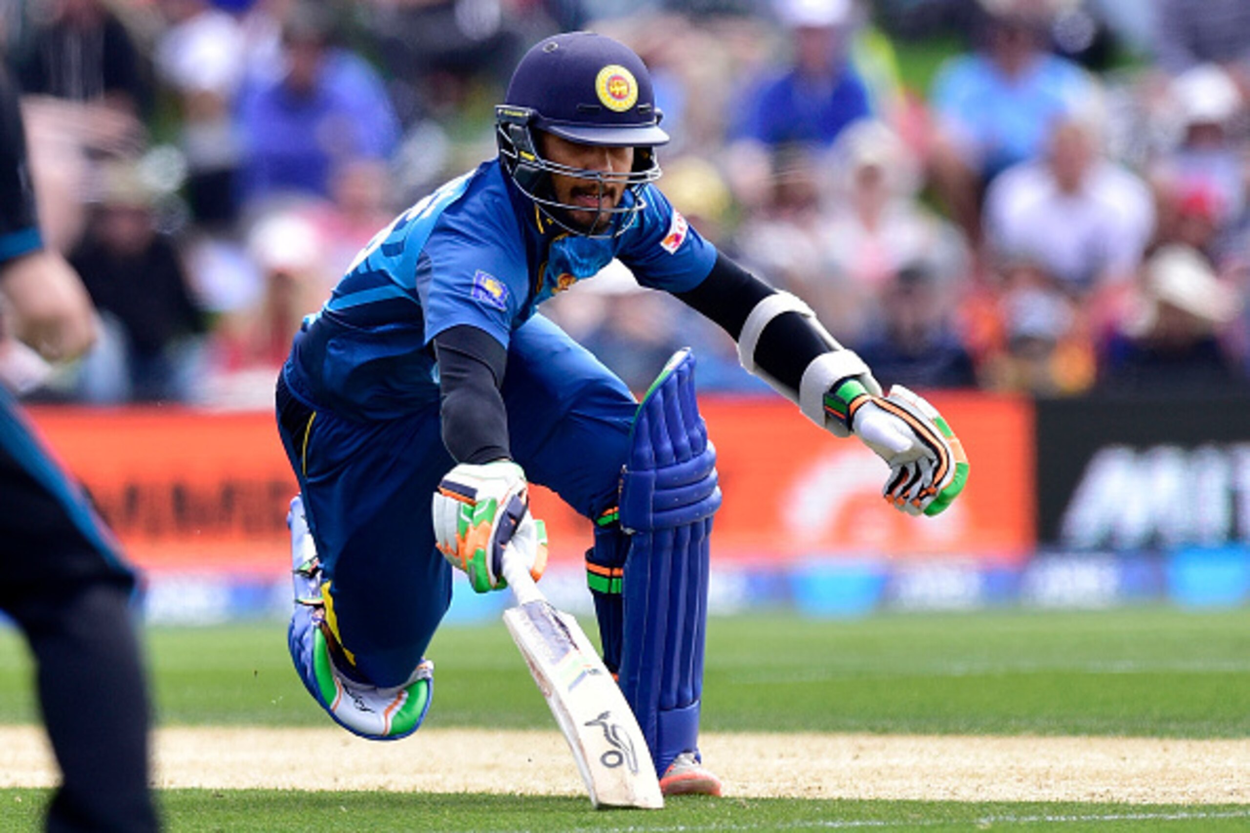 Dinesh Chandimal of Sri Lanka makes his ground during the 2nd ODI cricket match between New Zealand and Sri Lanka in Christchurch at Hagley Park on December 28, 2015.   AFP PHOTO / MARTY MELVILLE / AFP / Marty Melville        (Photo credit should read MAR