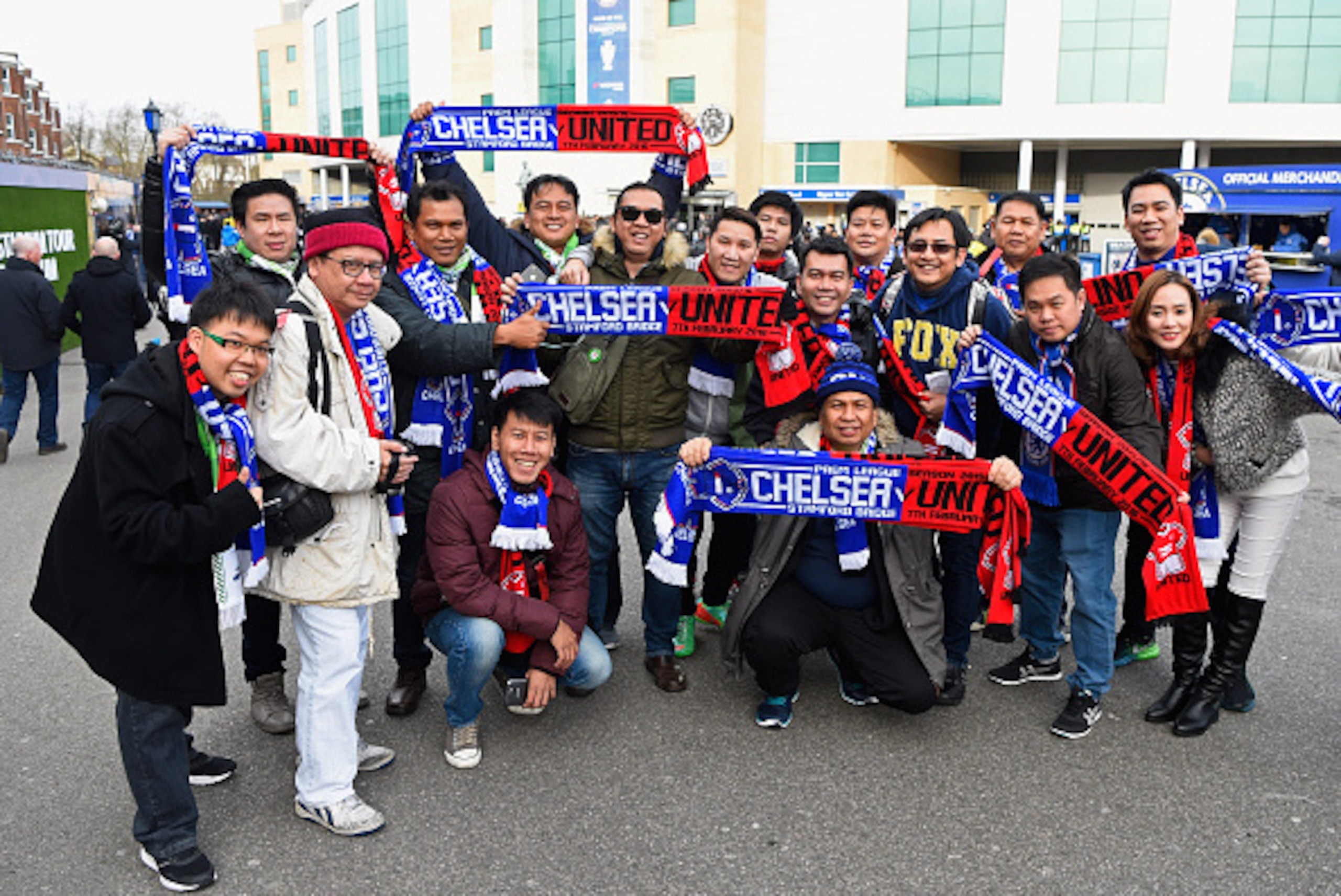 LONDON, ENGLAND - FEBRUARY 07:  Fans pose with scarves outside the stadium prior to the Barclays Premier League match between Chelsea and Manchester United at Stamford Bridge on February 7, 2016 in London, England.  (Photo by Mike Hewitt/Getty Images)