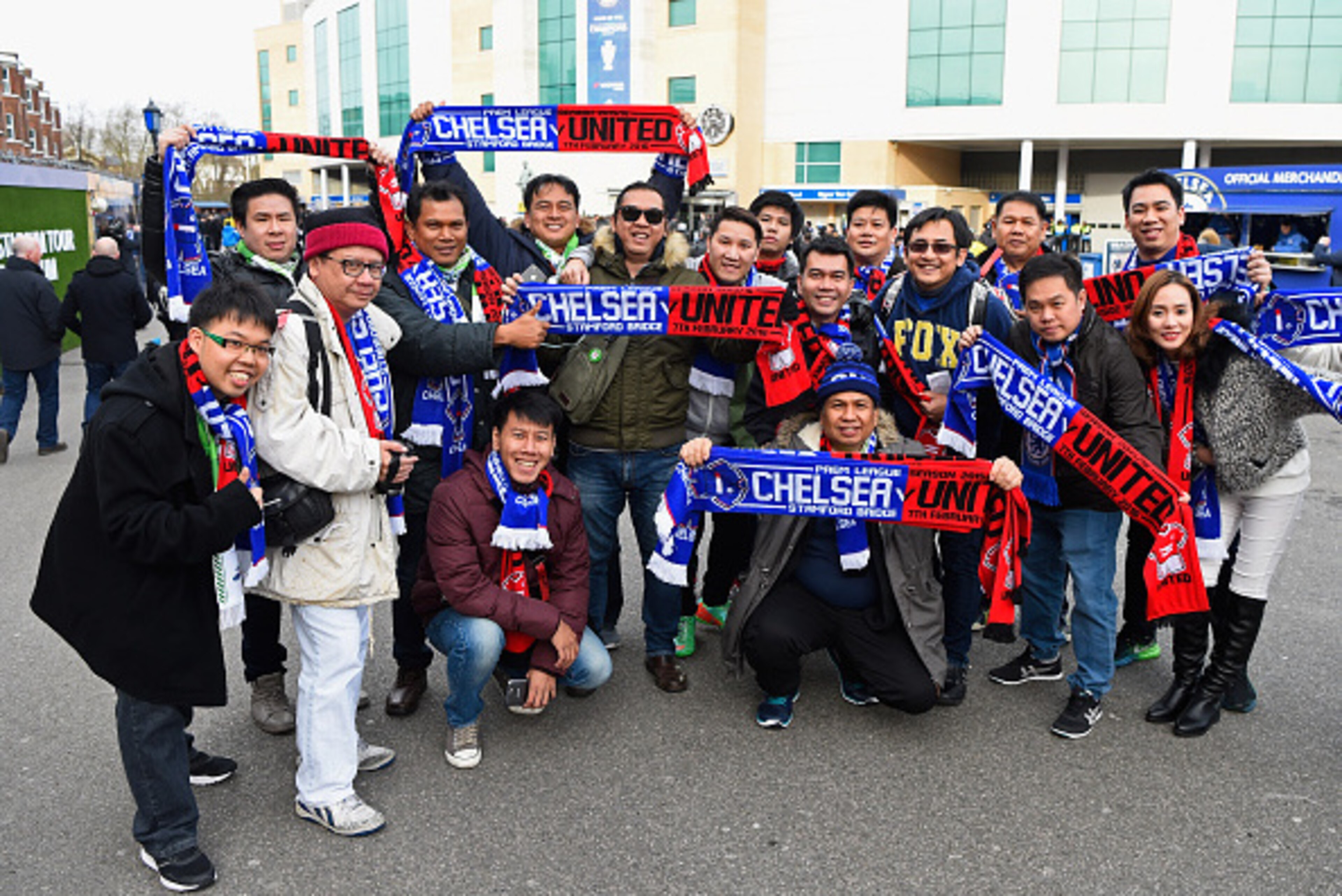 LONDON, ENGLAND - FEBRUARY 07:  Fans pose with scarves outside the stadium prior to the Barclays Premier League match between Chelsea and Manchester United at Stamford Bridge on February 7, 2016 in London, England.  (Photo by Mike Hewitt/Getty Images)