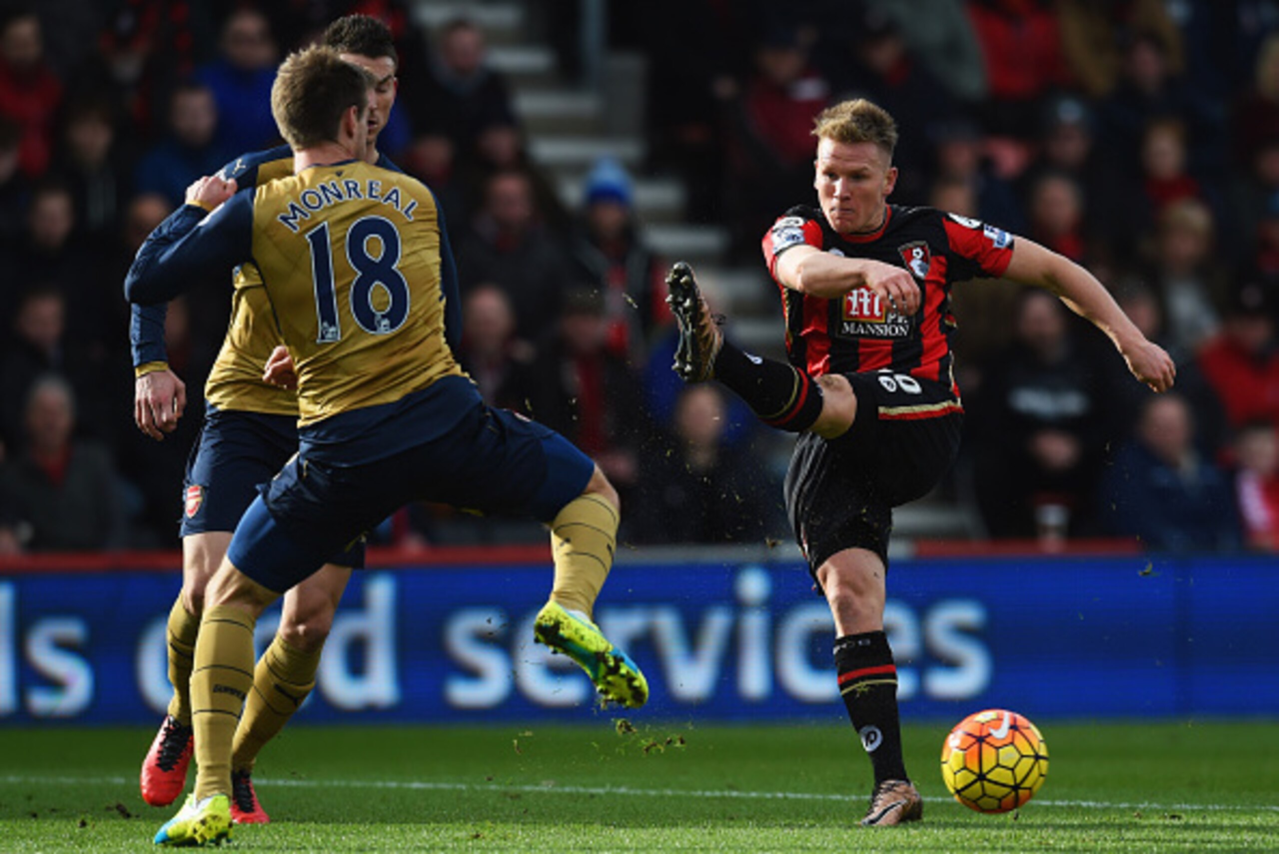 BOURNEMOUTH, ENGLAND - FEBRUARY 07:  Matt Ritchie of Bournemouth is blocked by Nacho Monreal of Arsenal (18) during the Barclays Premier League match between A.F.C. Bournemouth and Arsenal at the Vitality Stadium on February 7, 2016 in Bournemouth, Englan