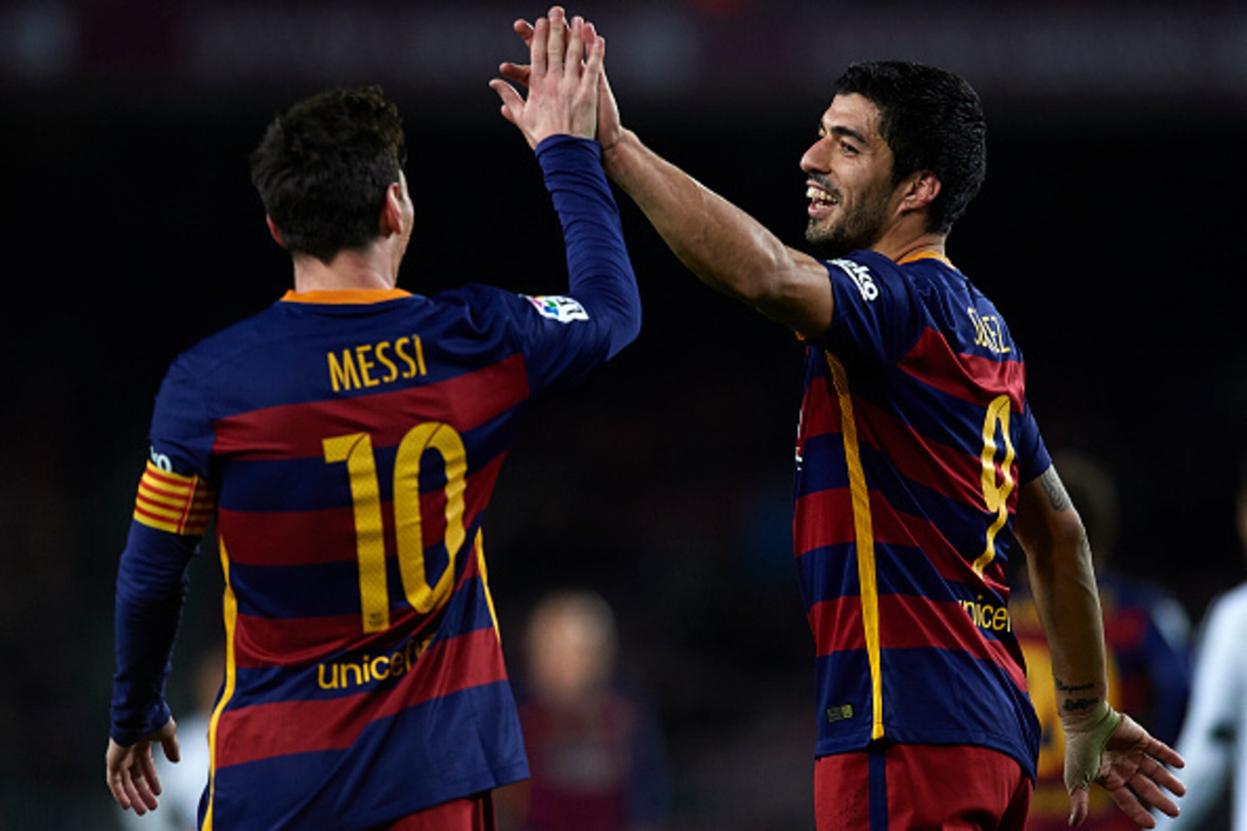 BARCELONA, SPAIN - FEBRUARY 03:  Luis Suarez of Barcelona celebrates with his teammate Lionel Messi (10) during the Copa del Rey Semi Final, first leg match between FC Barcelona and Valencia CF at Nou Camp on February 03, 2016 in Barcelona, Spain.  (Photo