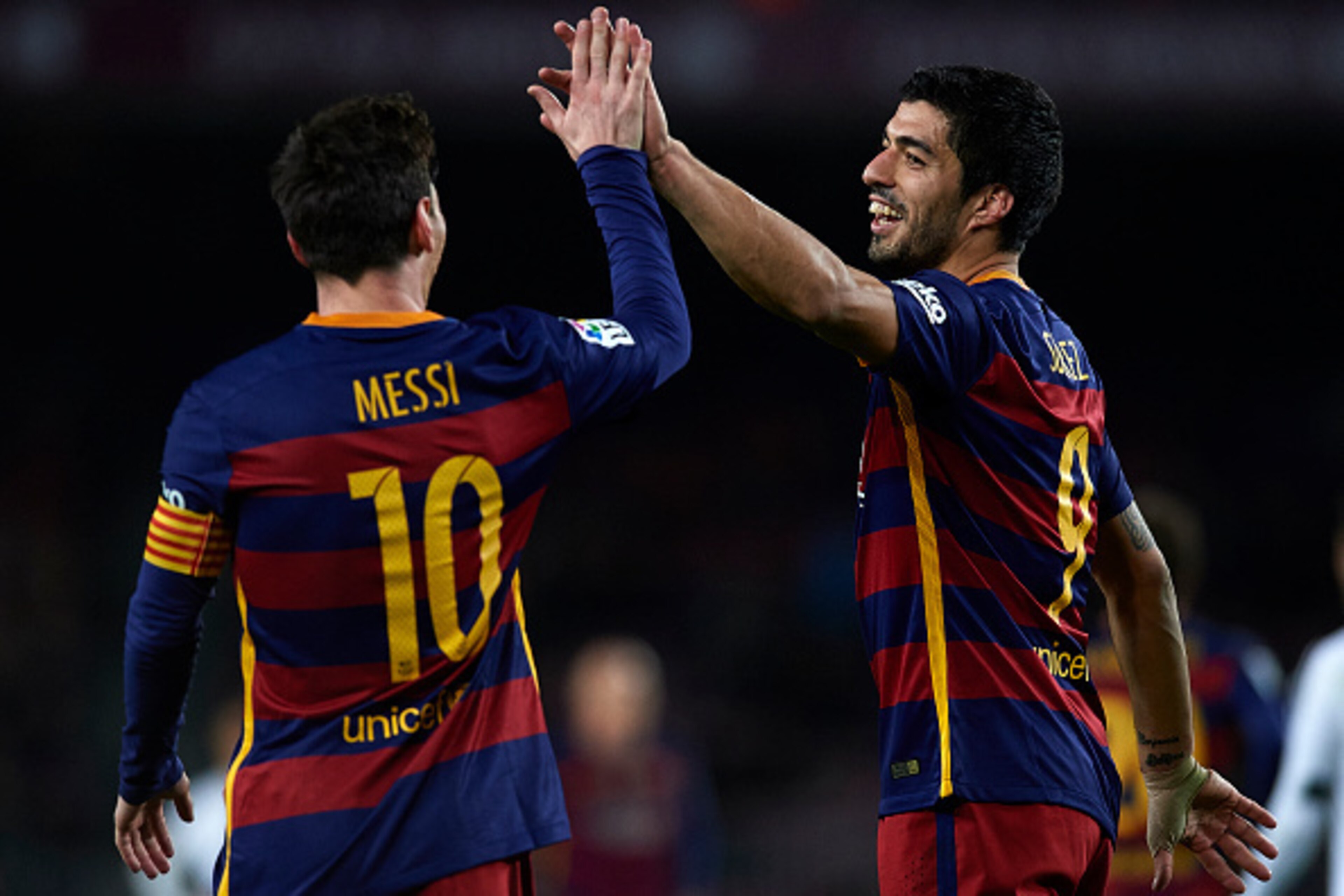 BARCELONA, SPAIN - FEBRUARY 03:  Luis Suarez of Barcelona celebrates with his teammate Lionel Messi (10) during the Copa del Rey Semi Final, first leg match between FC Barcelona and Valencia CF at Nou Camp on February 03, 2016 in Barcelona, Spain.  (Photo