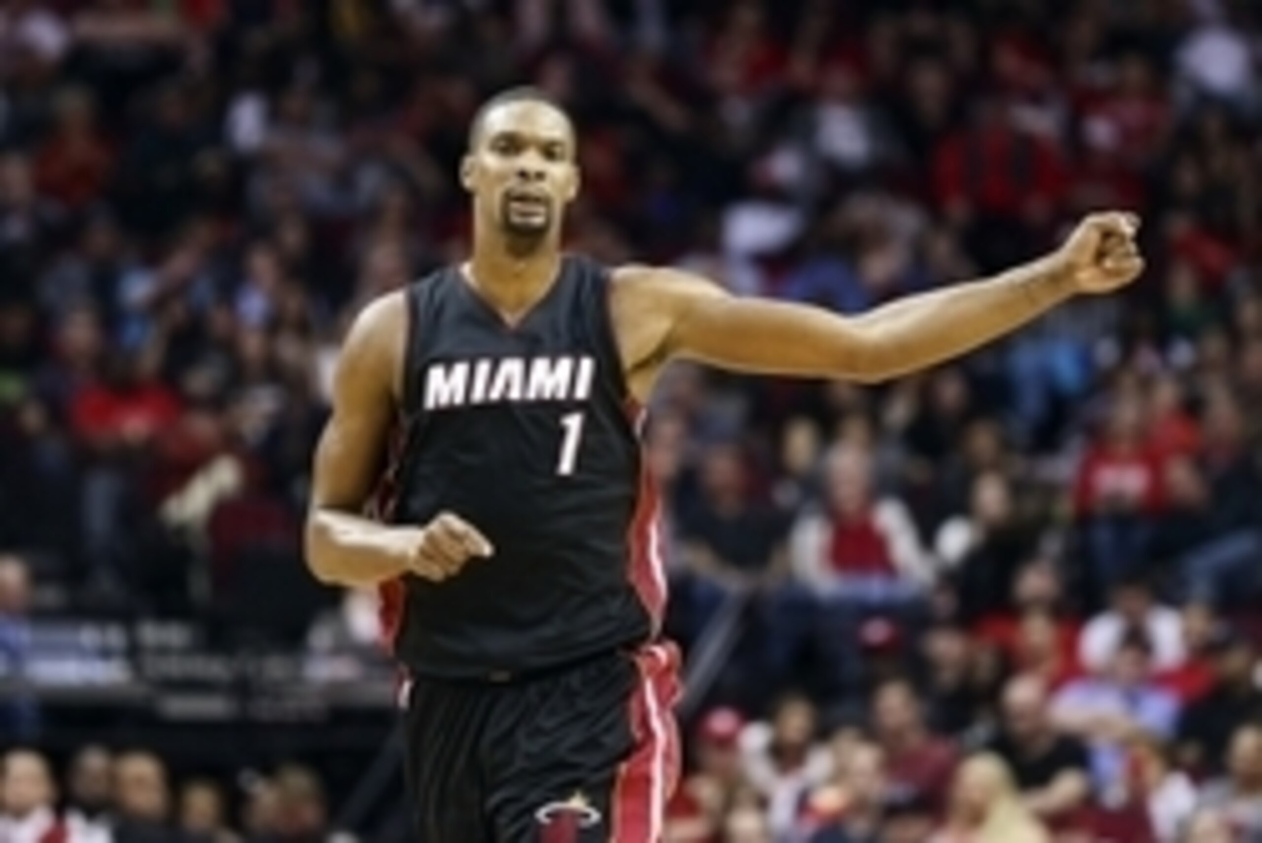Feb 2, 2016; Houston, TX, USA; Miami Heat forward Chris Bosh (1) runs up the court after a play during the fourth quarter against the Houston Rockets at Toyota Center. The Rockets won 115-102. Mandatory Credit: Troy Taormina-USA TODAY Sports