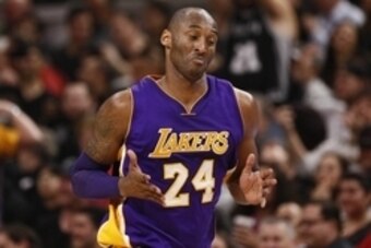Feb 6, 2016; San Antonio, TX, USA; Los Angeles Lakers small forward Kobe Bryant (24) gestures after hitting a three point shot during the second half against the San Antonio Spurs at AT&T Center. Mandatory Credit: Soobum Im-USA TODAY Sports