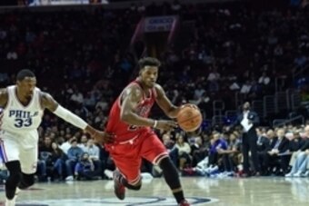Jan 14, 2016; Philadelphia, PA, USA; Chicago Bulls guard Jimmy Butler (21) moves toward the net during the fourth quarter of the game against the Philadelphia 76ers at the Wells Fargo Center. The Chicago Bulls won the game 115-111 in overtime. Mandatory C