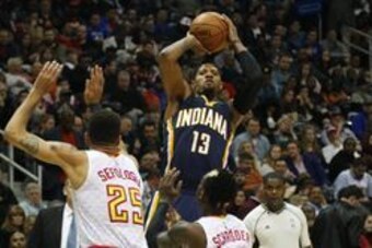 Feb 5, 2016; Atlanta, GA, USA; Indiana Pacers forward Paul George (13) shoots the ball against the Atlanta Hawks in the third quarter at Philips Arena. The Hawks defeated the Pacers 102-96. Mandatory Credit: Brett Davis-USA TODAY Sports
