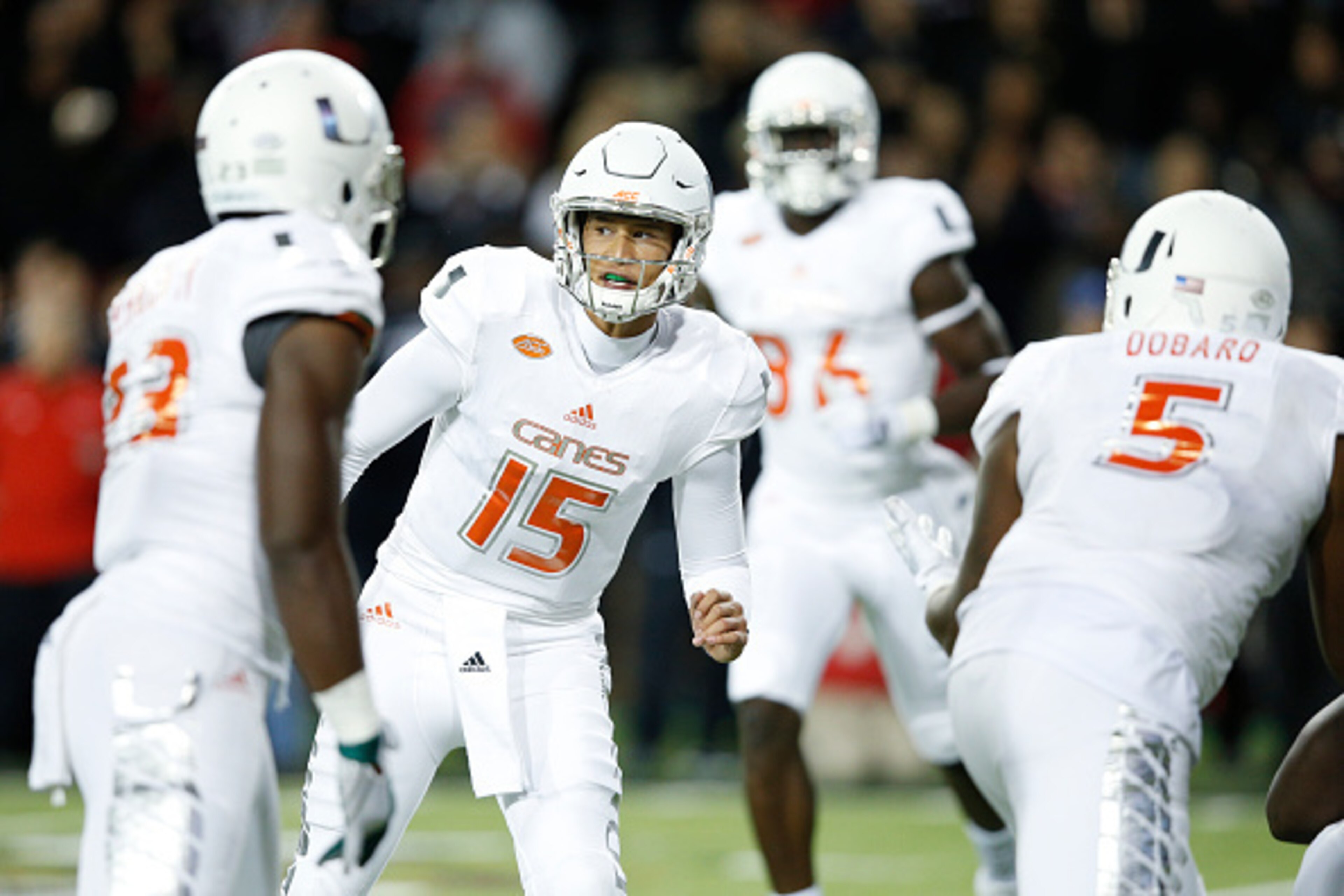 CINCINNATI, OH - OCTOBER 1: Brad Kaaya #15 of the Miami Hurricanes directs the offense against the Cincinnati Bearcats during a game at Nippert Stadium on October 1, 2015 in Cincinnati, Ohio. Cincinnati defeated Miami 34-23. (Photo by Joe Robbins/Getty Im