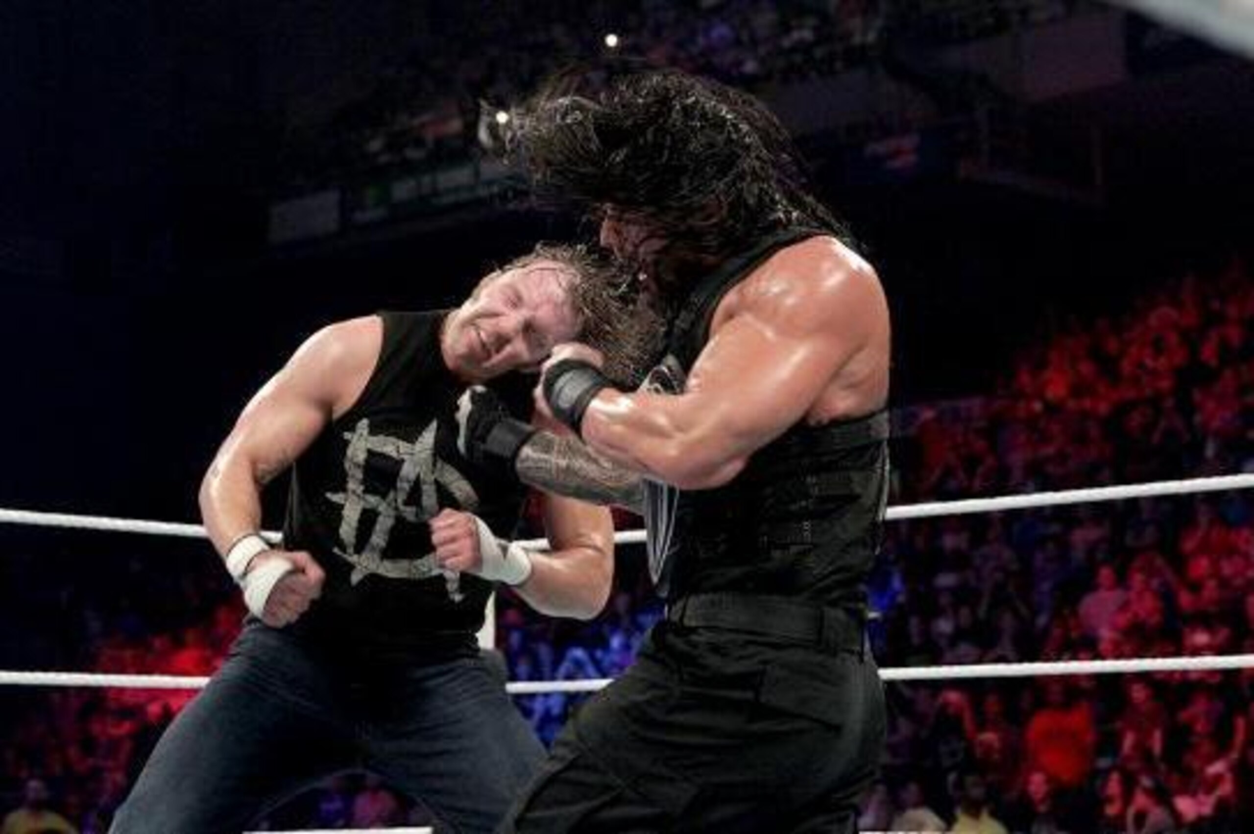 Dean Ambrose and Roman Reigns battle in a Fatal 4-Way at last year's Payback.