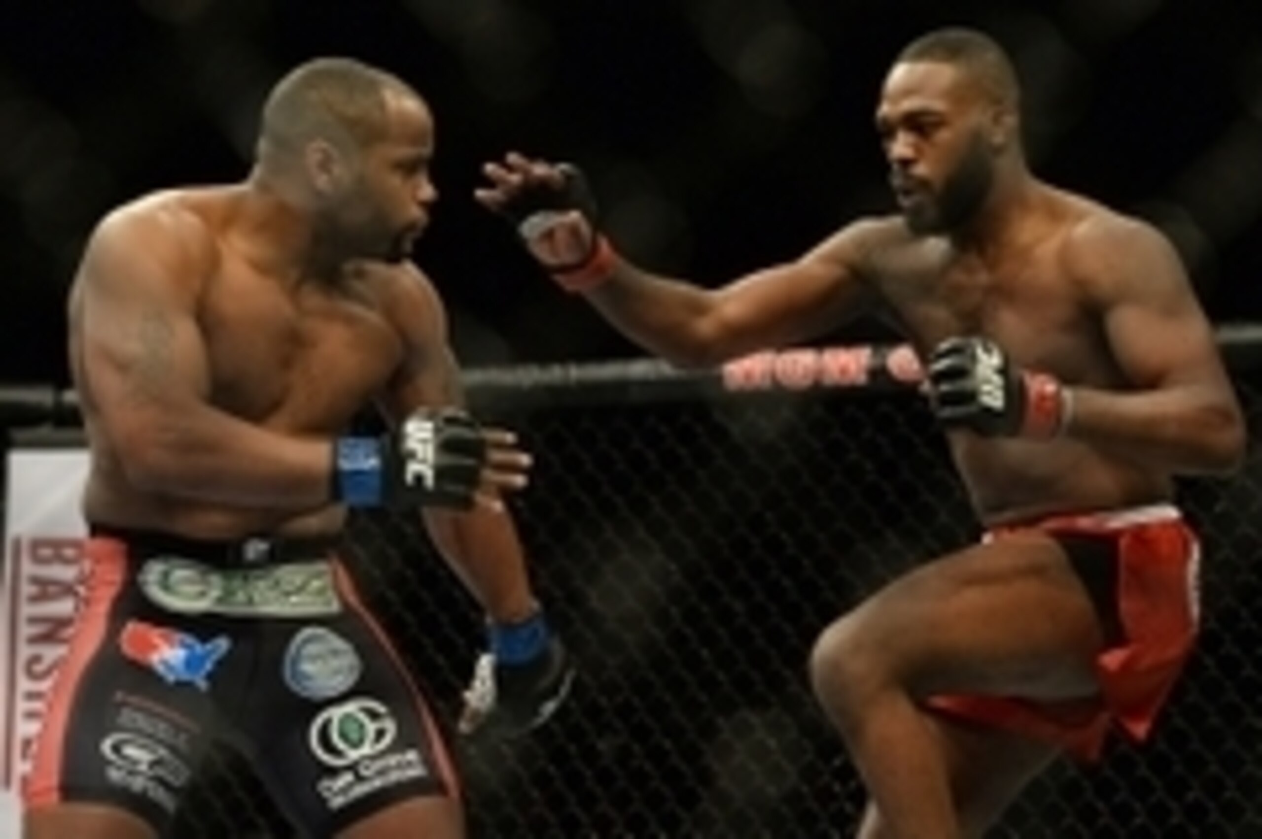 Jan 3, 2015; Las Vegas, NV, USA; Jon Jones (red gloves) and Daniel Cormier (blue gloves) compete in the light heavyweight title fight at UFC 182 at MGM Grand Garden Arena. Mandatory Credit: Jayne Kamin-Oncea-USA TODAY Sports