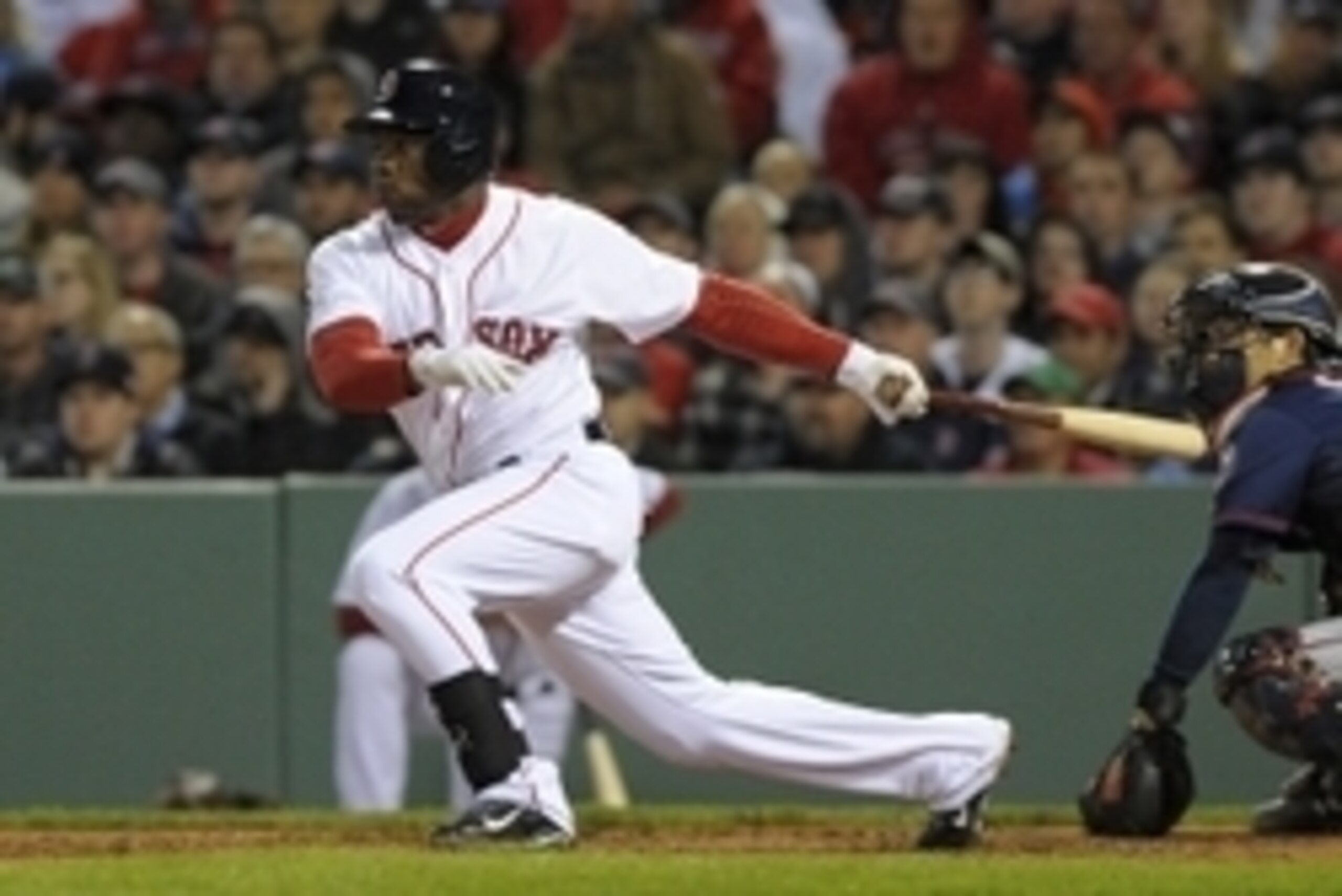 Jun 2, 2015; Boston, MA, USA; Boston Red Sox right fielder Rusney Castillo (38) hits an RBI single during the seventh inning against the Minnesota Twins at Fenway Park. Mandatory Credit: Bob DeChiara-USA TODAY Sports