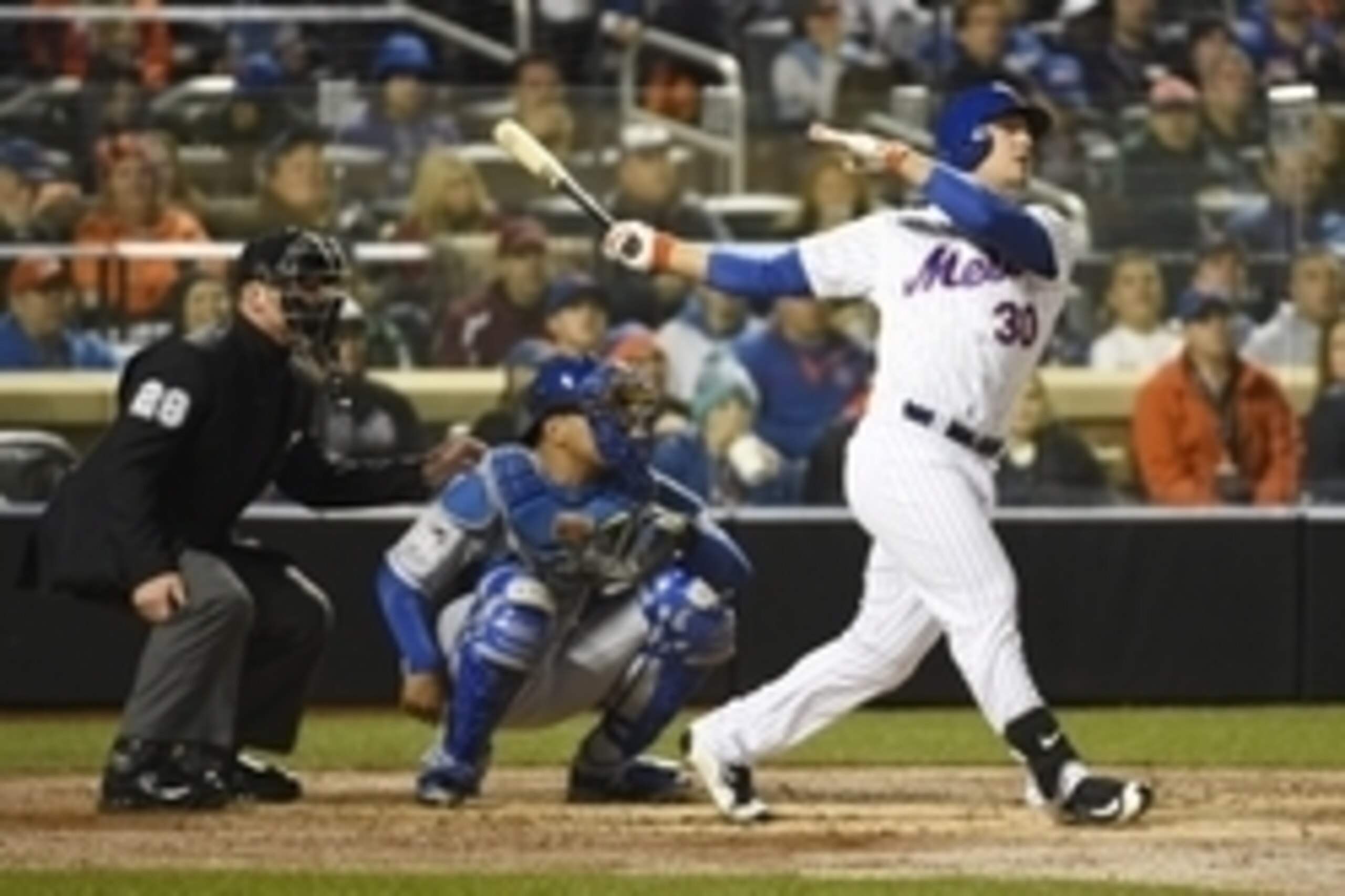 Oct 31, 2015; New York City, NY, USA; New York Mets left fielder Michael Conforto (30) hits a solo home run against the Kansas City Royals in the third inning in game four of the World Series at Citi Field. Mandatory Credit: Robert Deutsch-USA TODAY Sport