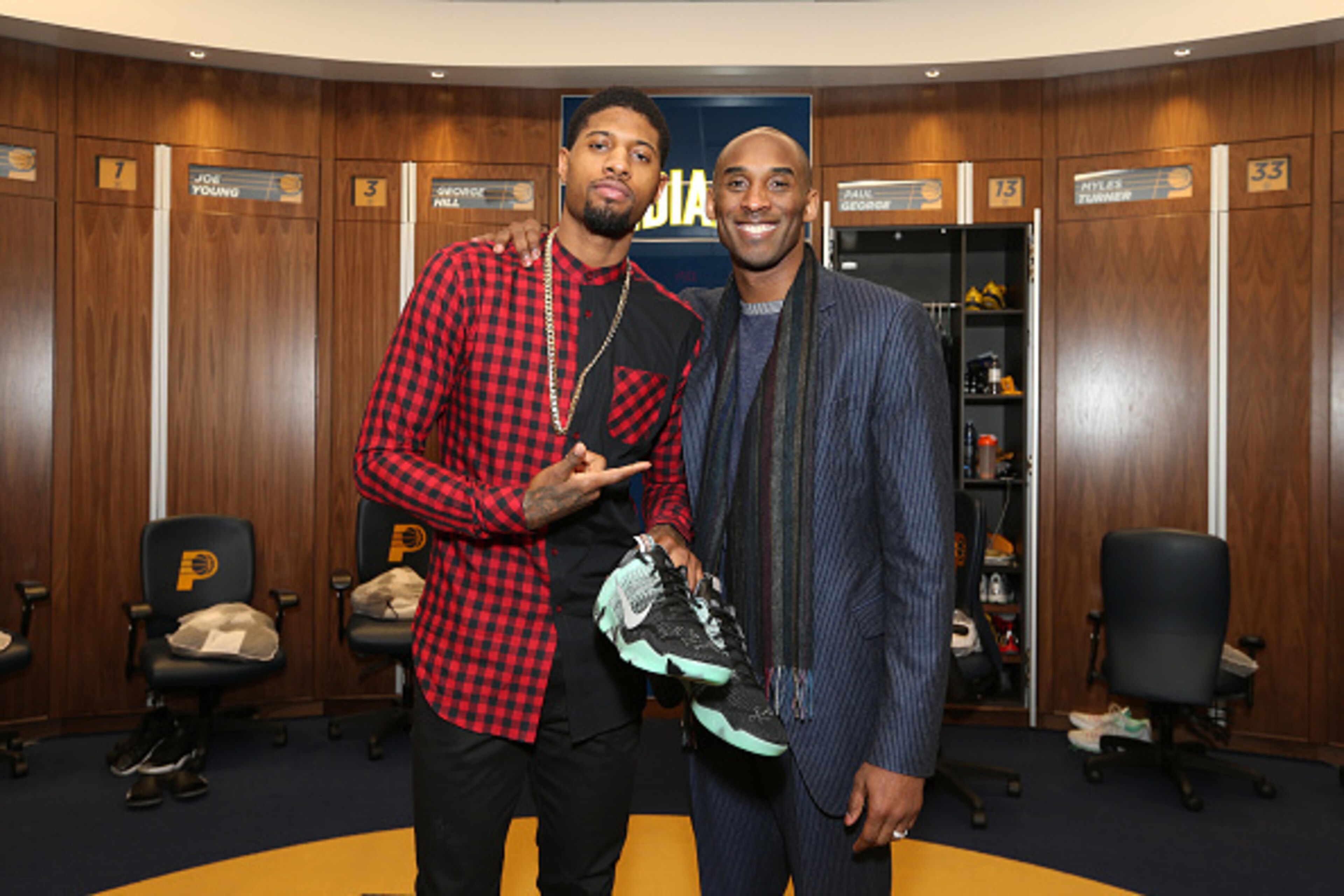 INDIANAPOLIS, IN - FEBRUARY 8: Paul George #13 of the Indiana Pacers and Kobe Bryant #24 of the Los Angeles Lakers are seen after the game on February 8, 2016 at Bankers Life Fieldhouse in Indianapolis, Indiana. NOTE TO USER: User expressly acknowledges a INDIANAPOLIS, IN - FEBRUARY 8: Paul George #13 of the Indiana Pacers and Kobe Bryant #24 of the Los Angeles Lakers are seen after the game on February 8, 2016 at Bankers Life Fieldhouse in Indianapolis, Indiana. NOTE TO USER: User expressly acknowledges a