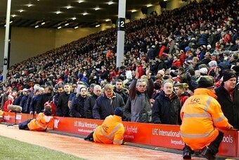 Liverpool fans leave the stands after 77 minutes' of play during the English Premier League football match between Liverpool and Sunderland at Anfield in Liverpool, northwest England, on February 6, 2016, in protest against the recent announcement that pr