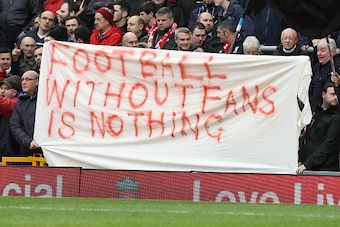 Liverpool fans hold a banner as they protest against the recently announced rise in ticket prices during the English Premier League football match between Liverpool and Sunderland at Anfield in Liverpool, northwest England, on February 6, 2016. / AFP / LI