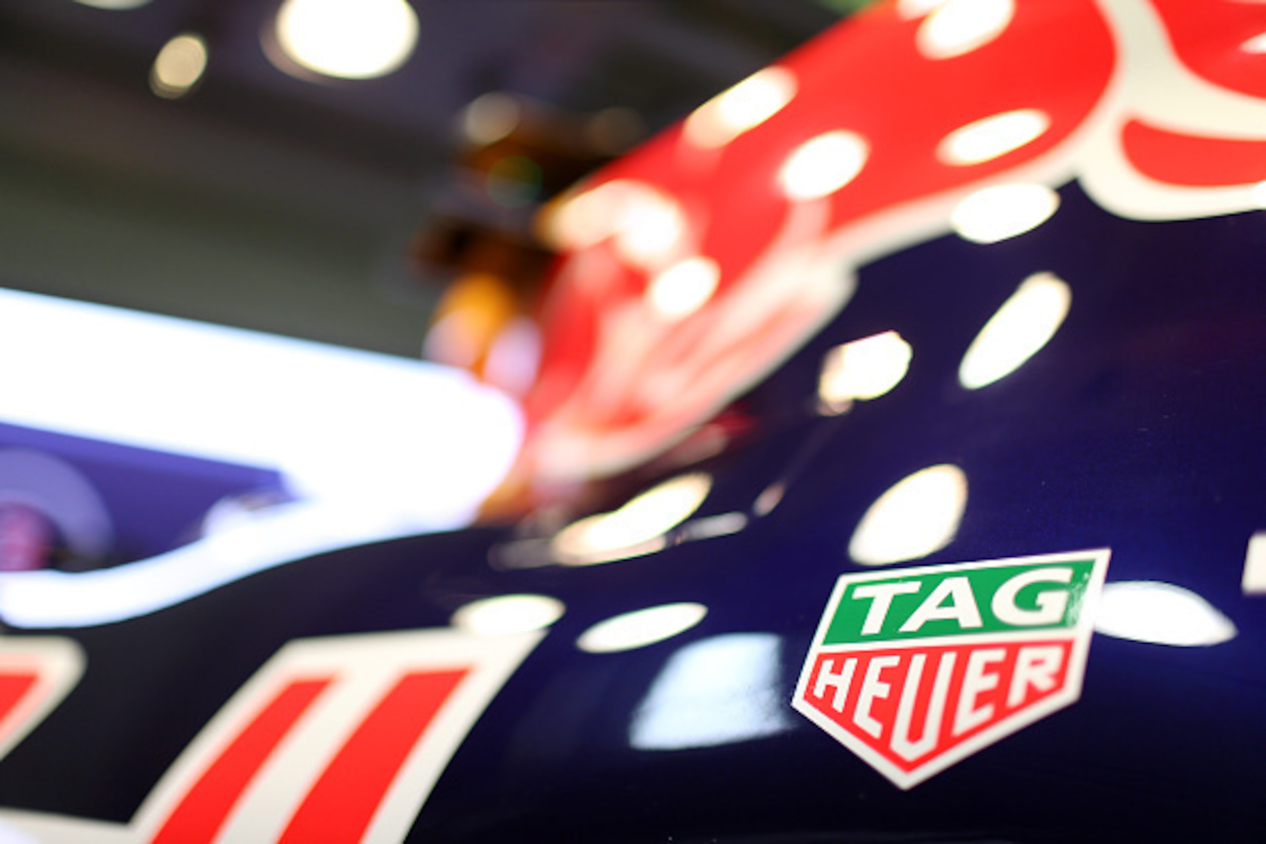 LE CASTELLET, FRANCE - JANUARY 25:  Daniel Ricciardo of Australia and Red Bull Racing sits in his car in the garage during day one of wet weather tyre testing at Circuit Paul Ricard on January 25, 2016 in Le Castellet, France.  (Photo by Mark Thompson/Get