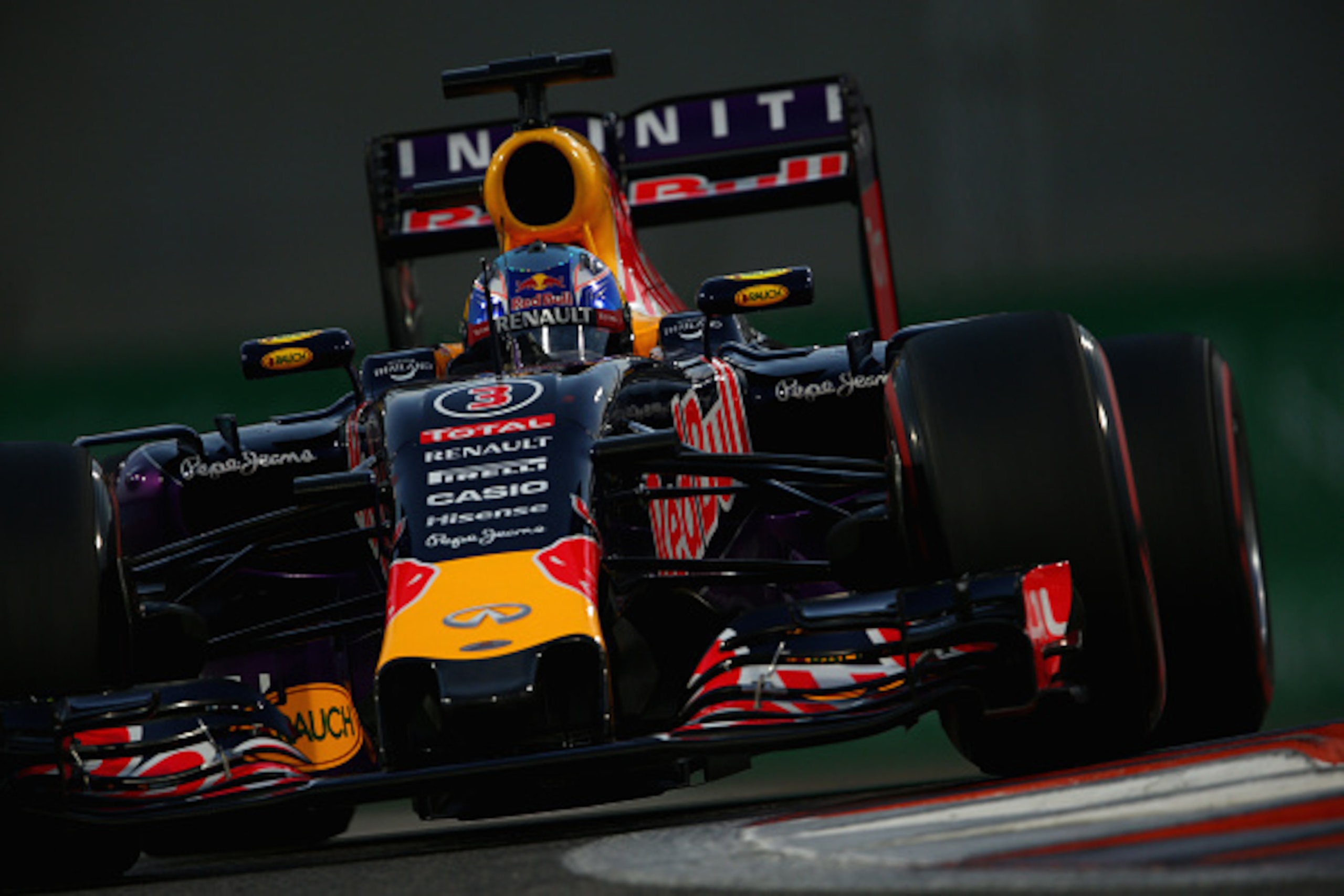 ABU DHABI, UNITED ARAB EMIRATES - NOVEMBER 28:  Daniel Ricciardo of Australia and Infiniti Red Bull Racing drives during qualifying for the Abu Dhabi Formula One Grand Prix at Yas Marina Circuit on November 28, 2015 in Abu Dhabi, United Arab Emirates.  (P