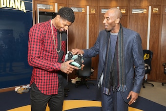 INDIANAPOLIS, IN - FEBRUARY 8: Paul George #13 of the Indiana Pacers and Kobe Bryant #24 of the Los Angeles Lakers are seen after the game on February 8, 2016 at Bankers Life Fieldhouse in Indianapolis, Indiana. NOTE TO USER: User expressly acknowledges a