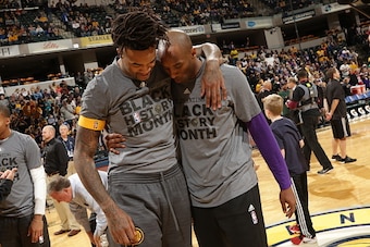 INDIANAPOLIS, IN - FEBRUARY 8:  Kobe Bryant #24 of the Los Angeles Lakers hugs Jordan Hill #27 of the Indiana Pacers before the game on February 8, 2016 at Bankers Life Fieldhouse in Indianapolis, Indiana. NOTE TO USER: User expressly acknowledges and agr