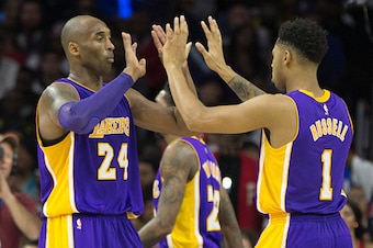 PHILADELPHIA, PA - DECEMBER 1: Kobe Bryant #24 and D'Angelo Russell #1 of the Los Angeles Lakers react in the game against the Philadelphia 76ers on December 1, 2015 at the Wells Fargo Center in Philadelphia, Pennsylvania. NOTE TO USER: User expressly ack