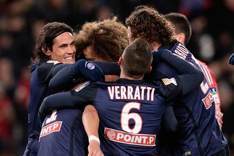 PARIS, FRANCE - JANUARY 13: Edinson Cavani (L) of Paris Saint-Germain celebrates Lucas Moura goal during the French League Cup game between Paris Saint-Germain and Olympique Lyonnais at Parc des Princes on January 13, 2016 in Paris, France. (Photo by Aure