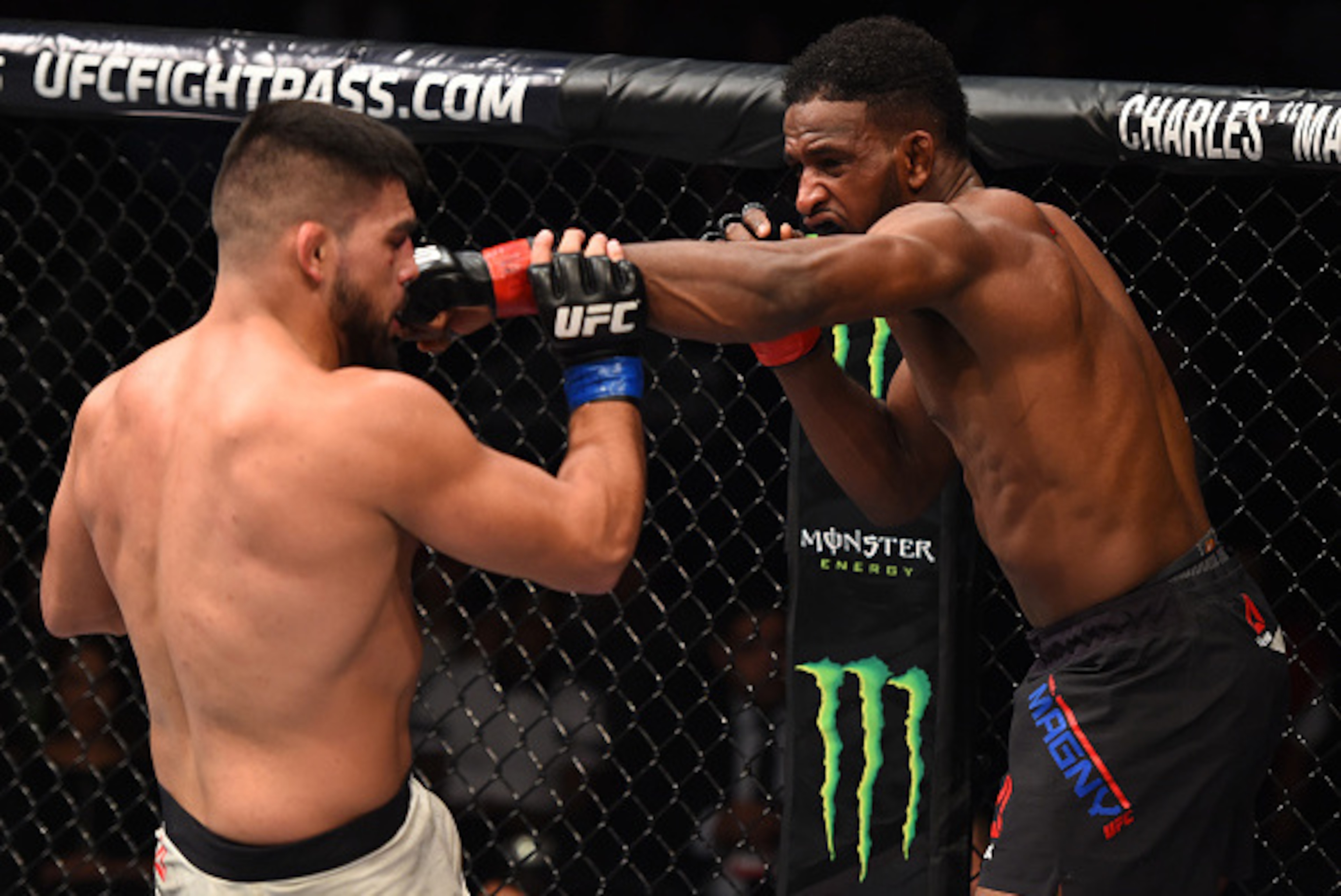 MONTERREY, MEXICO - NOVEMBER 21: (R-L) Neil Magny of the United States punches Kelvin Gastelum of the United States in their welterweight bout during the UFC Fight Night event at Arena Monterrey on November 21, 2015 in Monterrey, Mexico. (Photo by Jeff MONTERREY, MEXICO - NOVEMBER 21: (R-L) Neil Magny of the United States punches Kelvin Gastelum of the United States in their welterweight bout during the UFC Fight Night event at Arena Monterrey on November 21, 2015 in Monterrey, Mexico. (Photo by Jeff