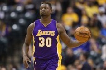 Feb 8, 2016; Indianapolis, IN, USA; Los Angeles Lakers forward Julius Randle (30) controls the ball against the Indiana Pacers at Bankers Life Fieldhouse. The Indiana Pacers defeat the Los Angeles Lakers 89-87. Mandatory Credit: Brian Spurlock-USA TODAY S