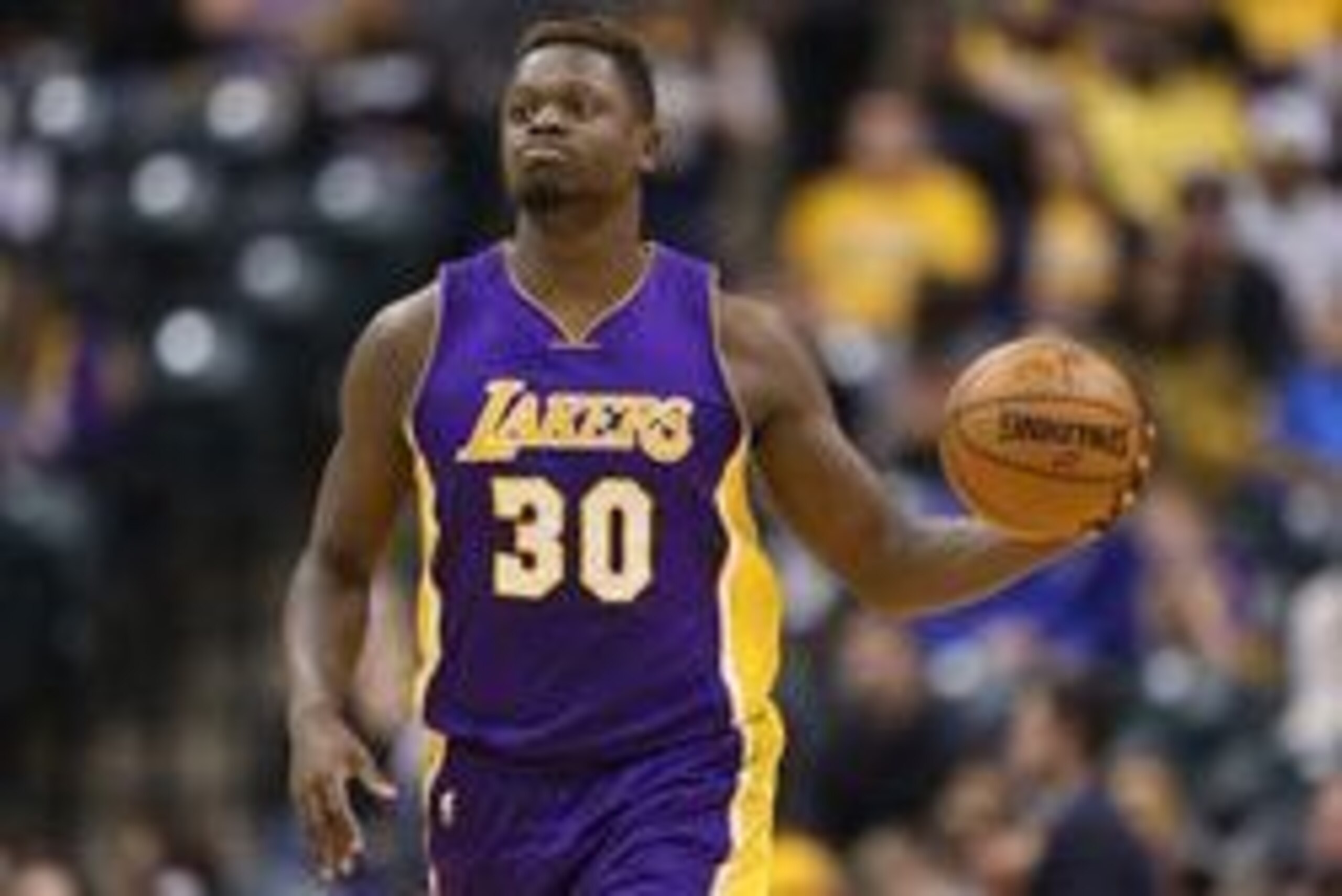 Feb 8, 2016; Indianapolis, IN, USA; Los Angeles Lakers forward Julius Randle (30) controls the ball against the Indiana Pacers at Bankers Life Fieldhouse. The Indiana Pacers defeat the Los Angeles Lakers 89-87. Mandatory Credit: Brian Spurlock-USA TODAY S