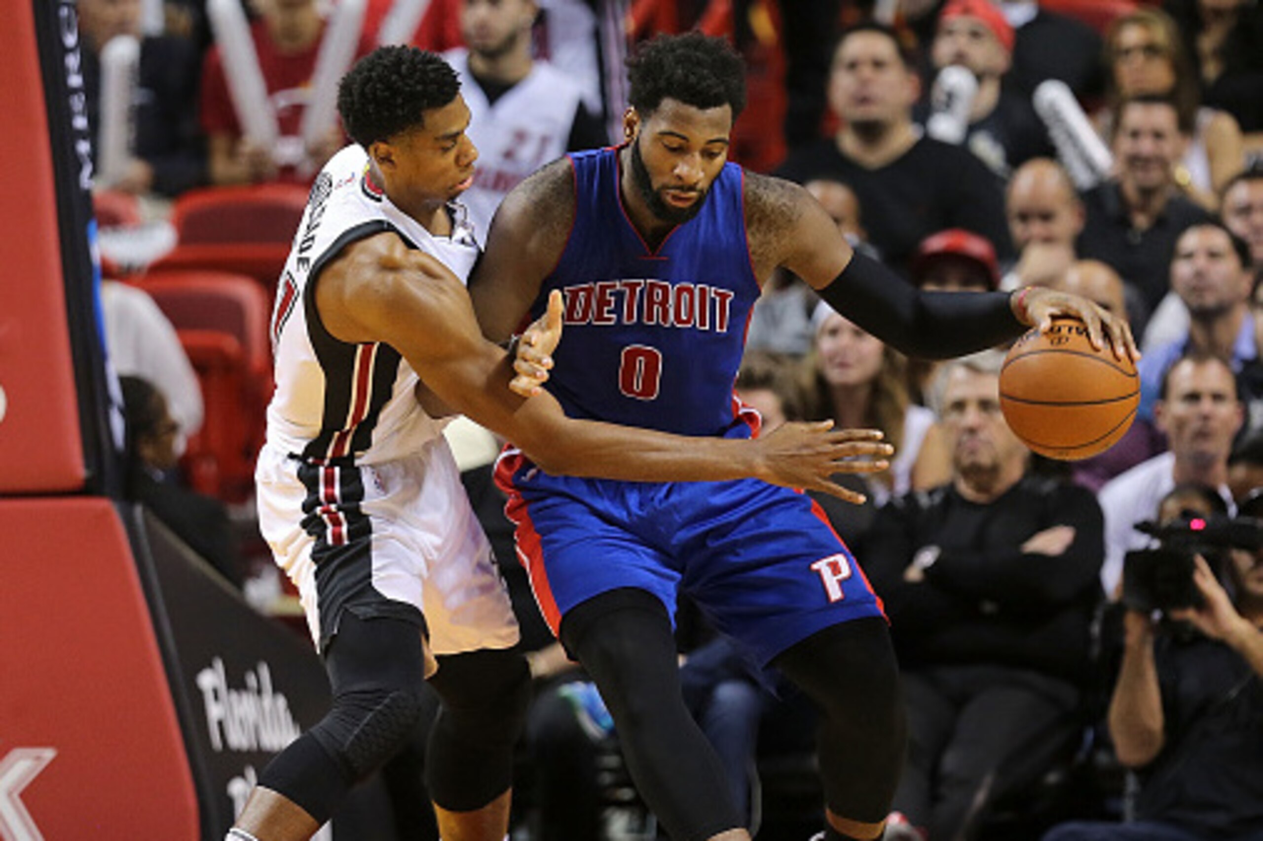 MIAMI, FL - DECEMBER 22: Andre Drummond #0 of the Detroit Pistons posts up Hassan Whiteside #21 of the Miami Heat during a game  at American Airlines Arena on December 22, 2015 in Miami, Florida. NOTE TO USER: User expressly acknowledges and agrees that, 