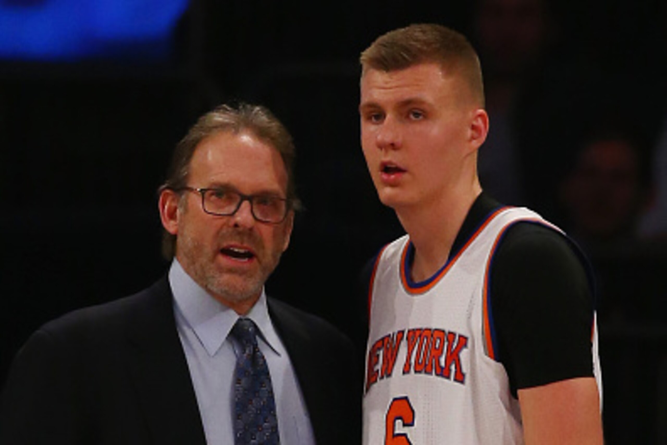 NEW YORK, NY - FEBRUARY 09:  Interim Head Coach Kurt Rambis of the New York Knicks speaks to Kristaps Porzingis #6 during their game against the Washington Wizards at Madison Square Garden on February 9, 2016 in New York City.   NOTE TO USER: User express