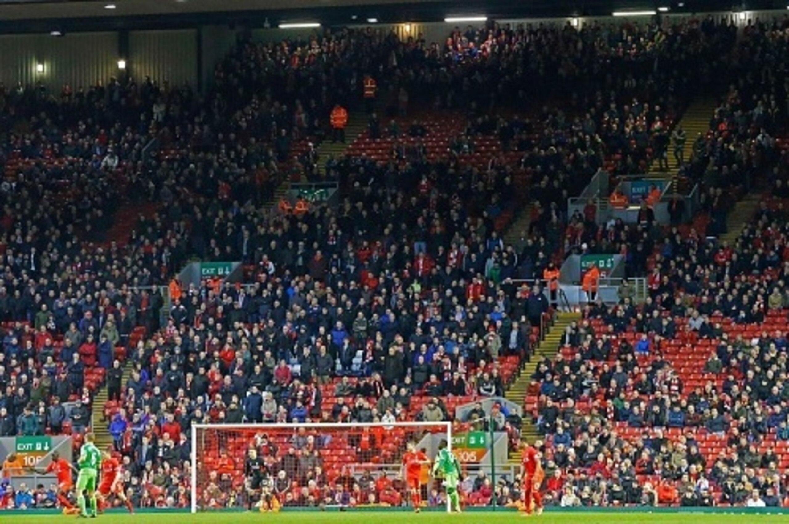 Liverpool fans leave the stands at the Kop End after 77 minutes' of play during the English Premier League football match between Liverpool and Sunderland at Anfield in Liverpool, northwest England, on February 6, 2016, in protest against the recent annou