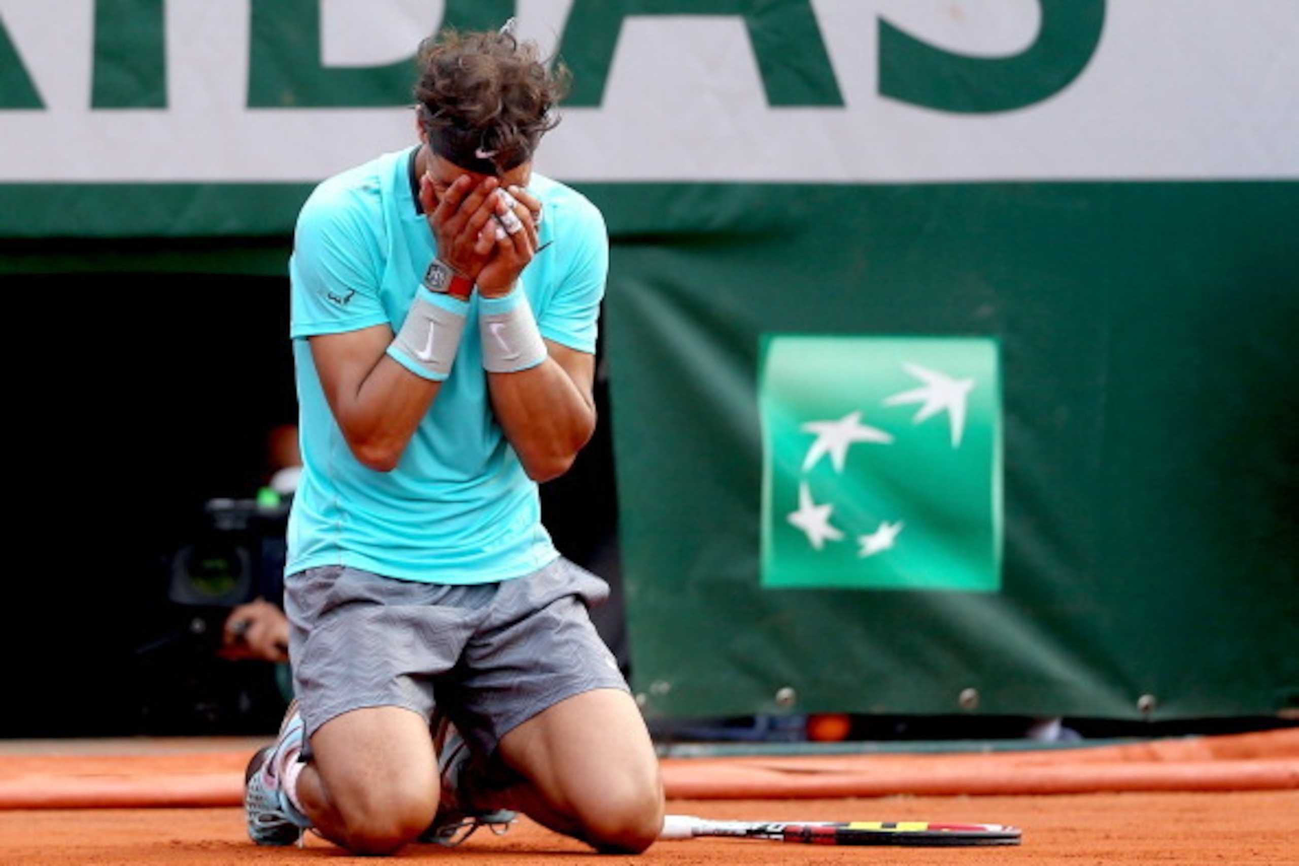 PARIS, FRANCE - JUNE 08:  Rafael Nadal of Spain celebrates match point during his men's singles final match against Novak Djokovic of Serbia on day fifteen of the French Open at Roland Garros on June 8, 2014 in Paris, France.  (Photo by Matthew Stockman/G