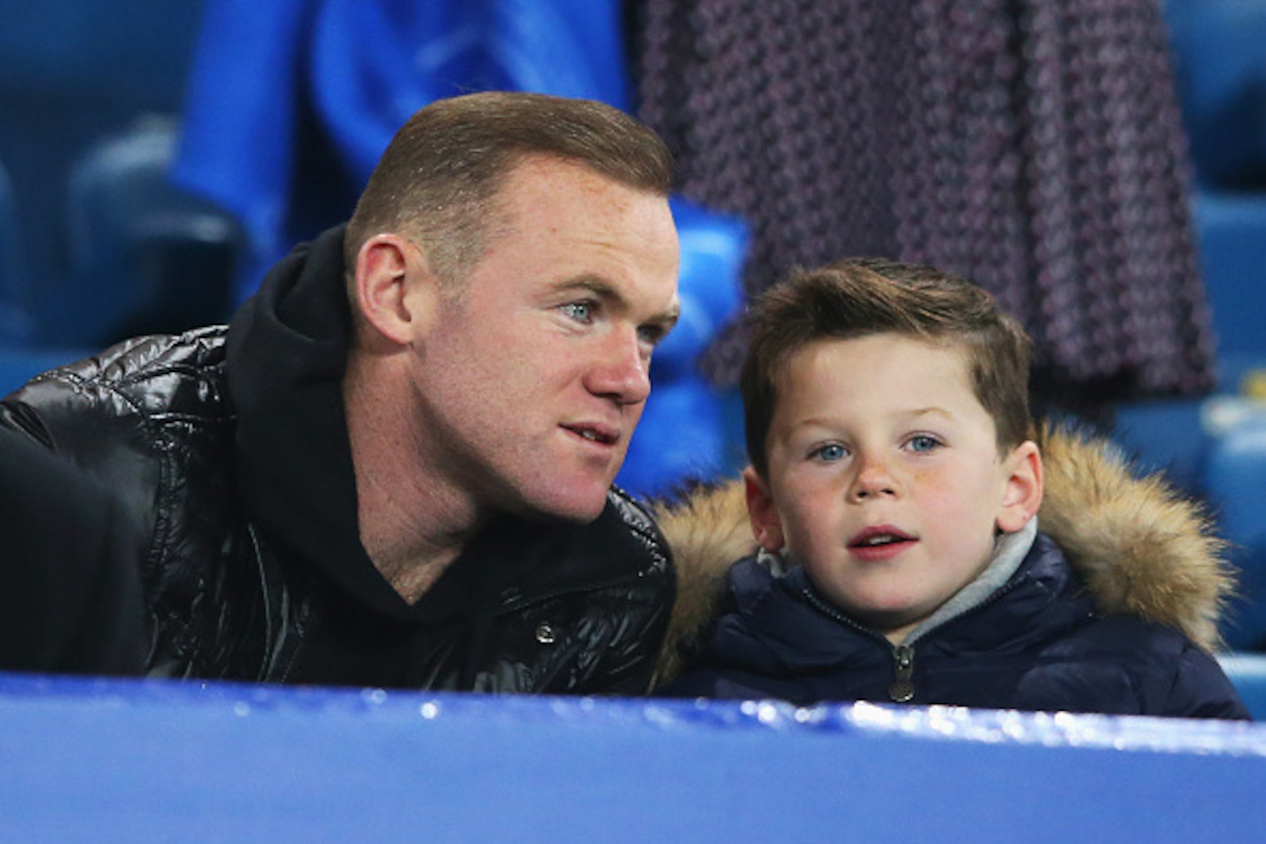 LIVERPOOL, ENGLAND - DECEMBER 07:  Wayne Rooney of Manchester United and son Kai attend the Barclays Premier League match between Everton and Crystal Palace at Goodison Park on December 7, 2015 in Liverpool, England.  (Photo by Alex Livesey/Getty Images)