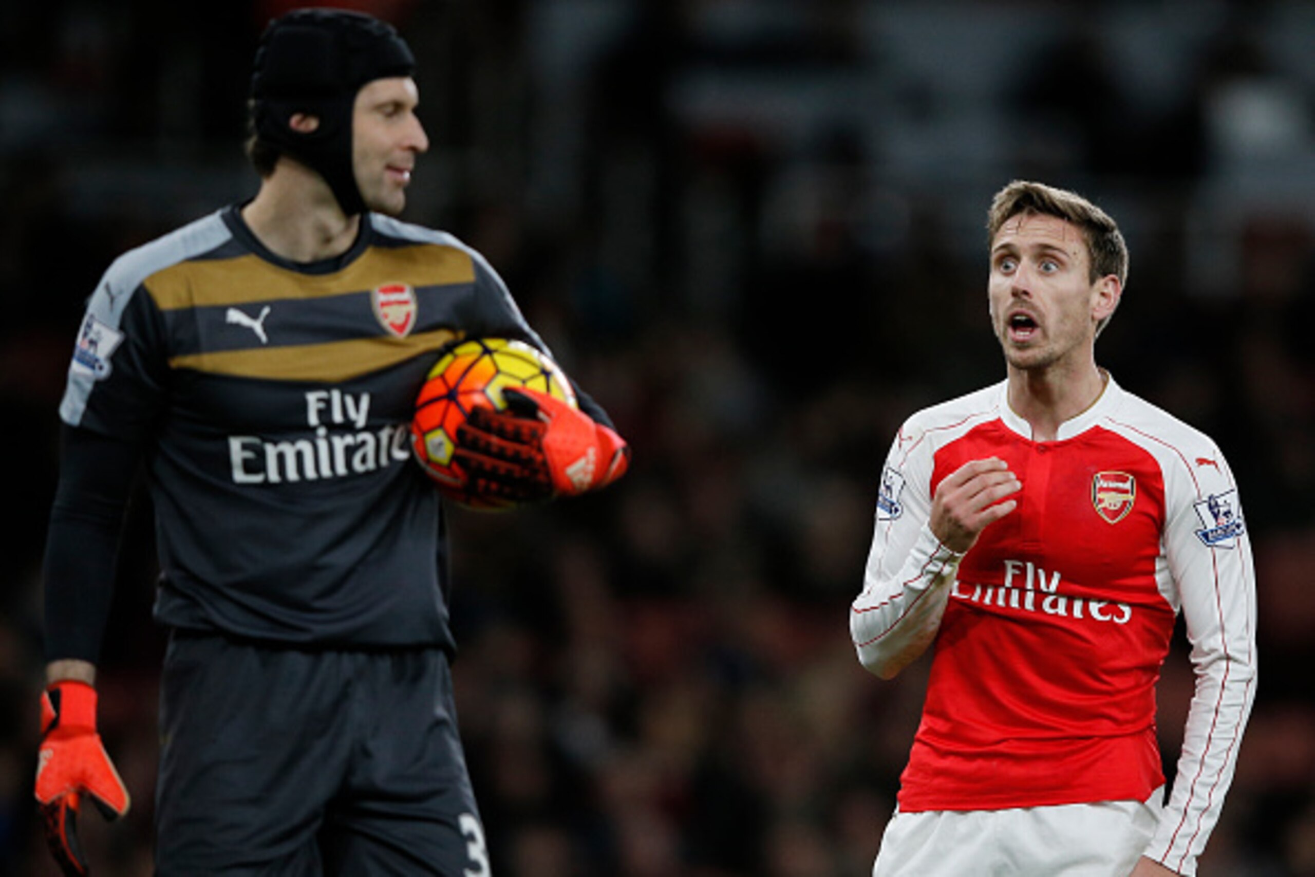 Arsenal's Spanish defender Nacho Monreal (R) reacts with Arsenal's Czech goalkeeper Petr Cech after almost scoring an own goal during the English Premier League football match between Arsenal and Sunderland at the Emirates Stadium in London on December 5, Arsenal's Spanish defender Nacho Monreal (R) reacts with Arsenal's Czech goalkeeper Petr Cech after almost scoring an own goal during the English Premier League football match between Arsenal and Sunderland at the Emirates Stadium in London on December 5,