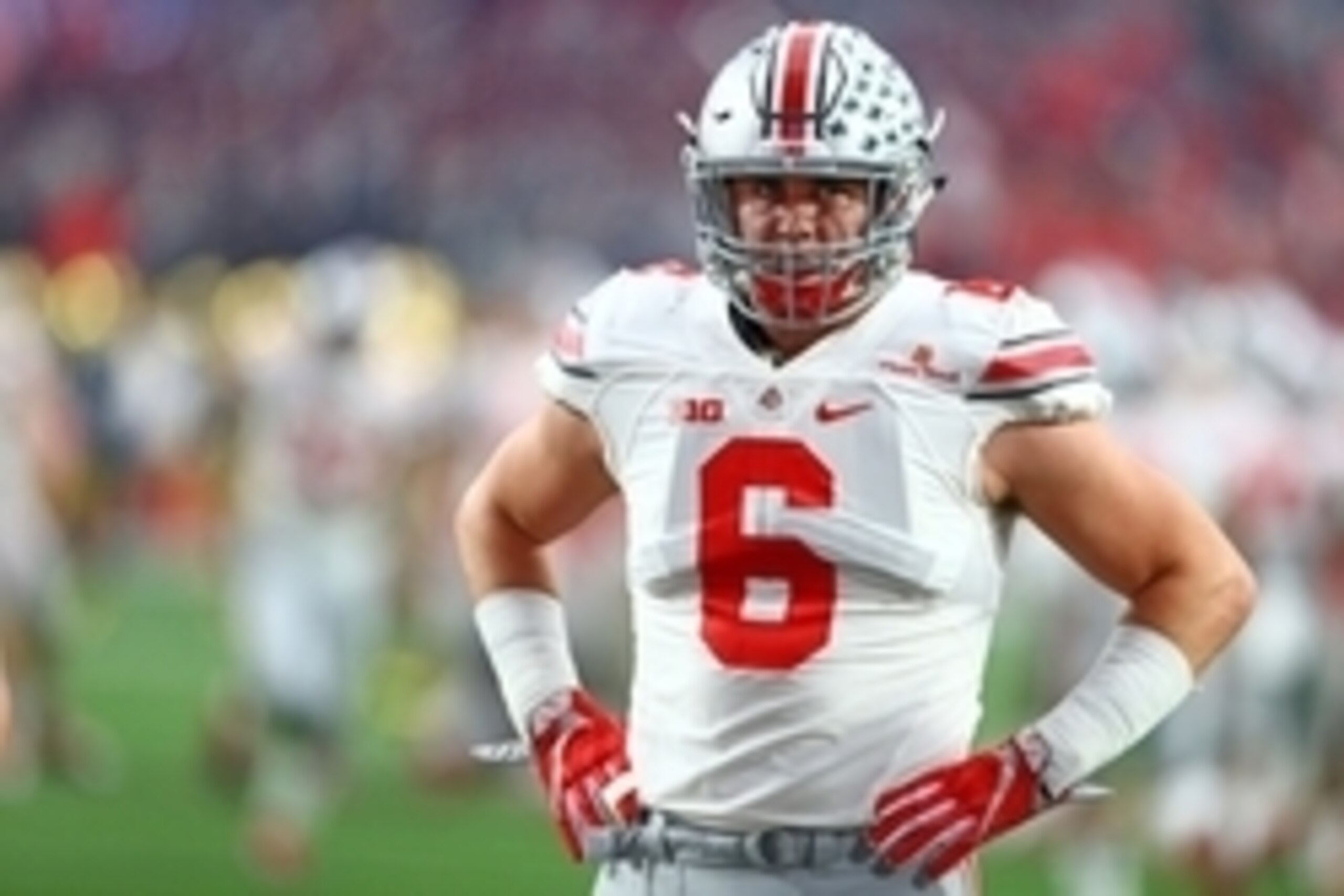 Jan 1, 2016; Glendale, AZ, USA; Ohio State Buckeyes defensive end Sam Hubbard (6) against the Notre Dame Fighting Irish during the 2016 Fiesta Bowl at University of Phoenix Stadium. The Buckeyes defeated the Fighting Irish 44-28. Mandatory Credit: Mark J.