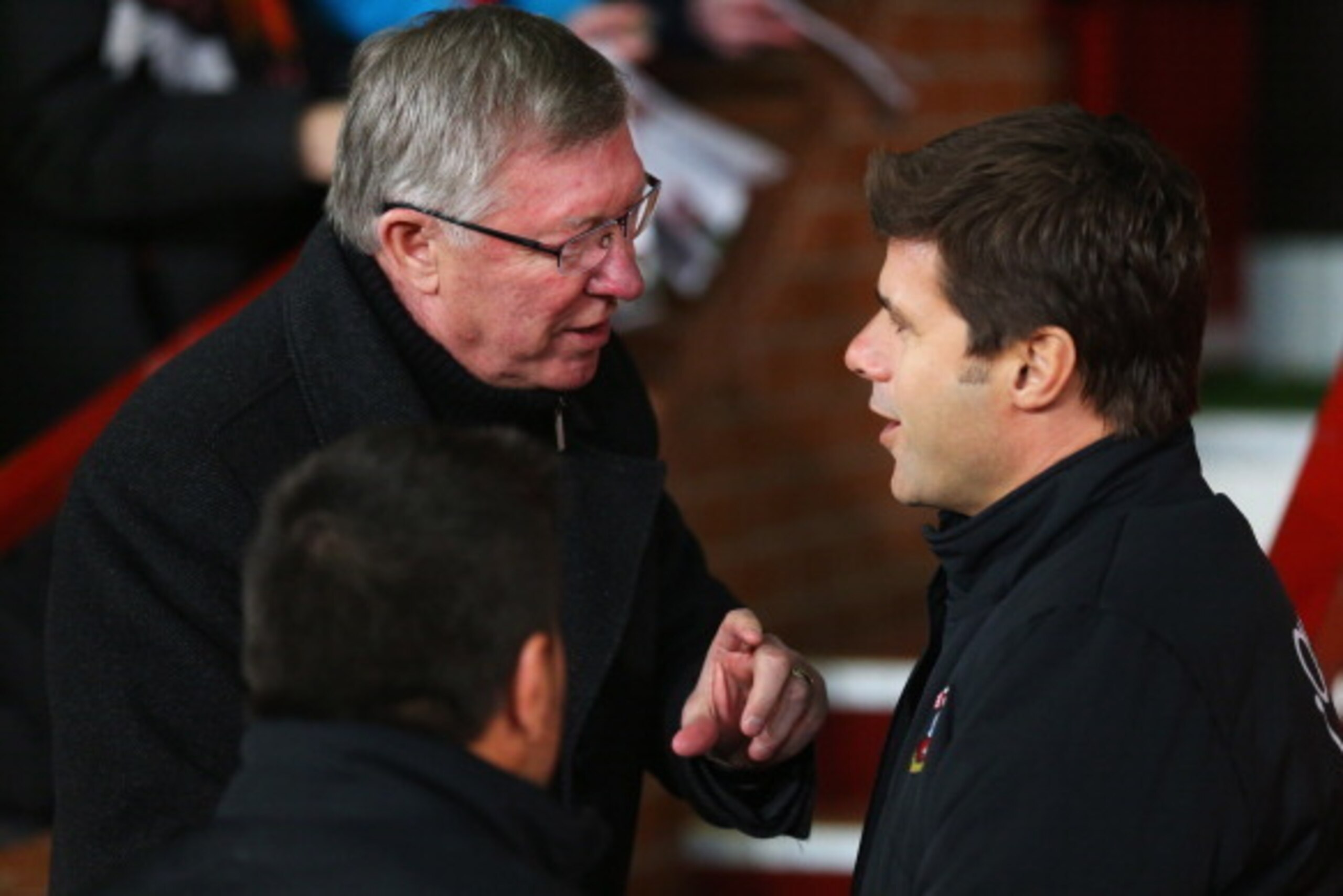 MANCHESTER, ENGLAND - JANUARY 30:  Sir Alex Ferguson manager of Manchester United talks to Mauricio Pochettino manager of Southampton prior to the Barclays Premier League match between Manchester United and Southampton at Old Trafford on January 30, 2013 