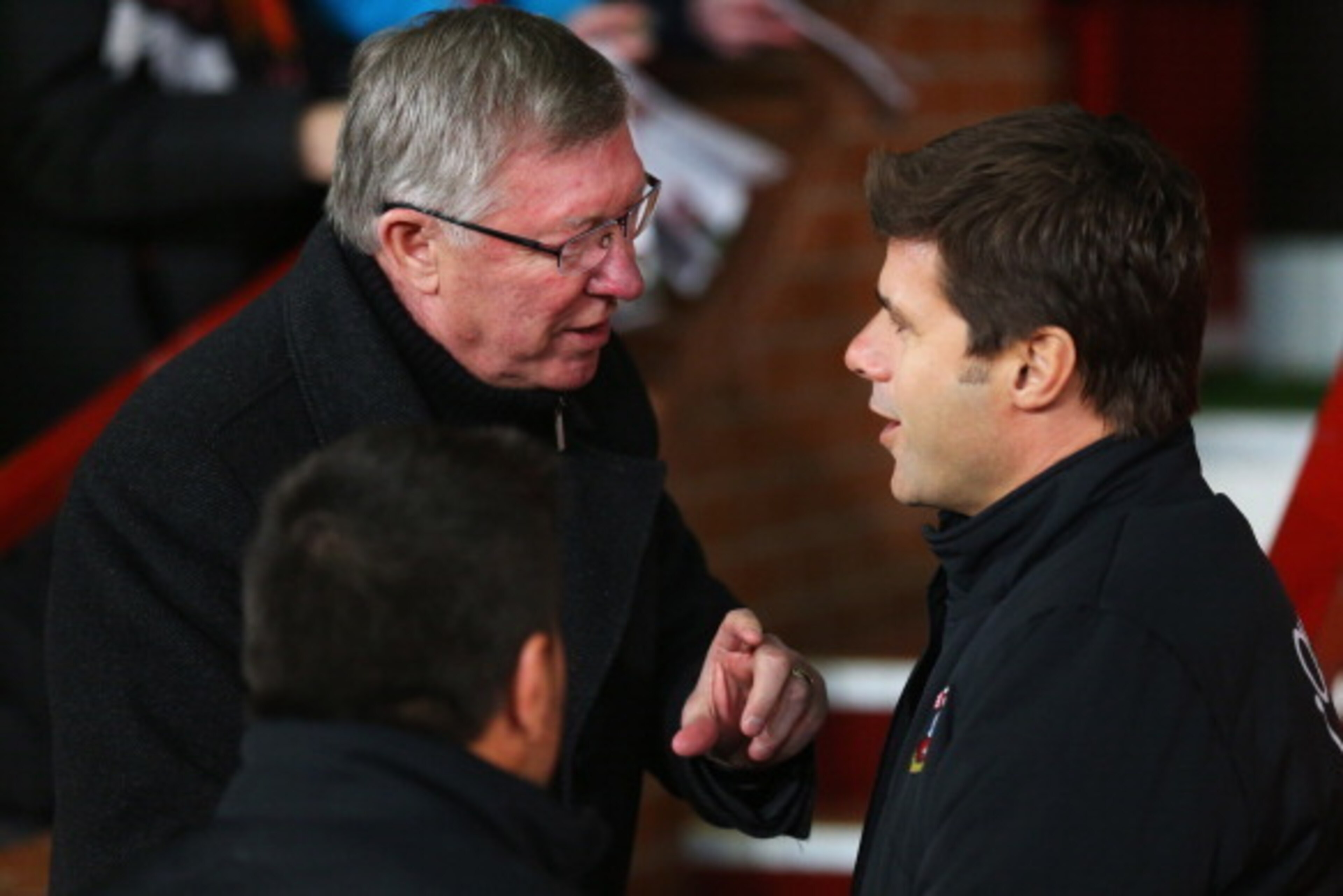 MANCHESTER, ENGLAND - JANUARY 30:  Sir Alex Ferguson manager of Manchester United talks to Mauricio Pochettino manager of Southampton prior to the Barclays Premier League match between Manchester United and Southampton at Old Trafford on January 30, 2013 