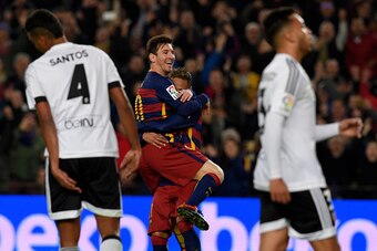 Barcelona's Argentinian forward Lionel Messi (L) celebrates a goal with Barcelona's Brazilian forward Neymar during the Spanish Copa del Rey (King's Cup) football match FC Barcelona vs Valencia CF at the Camp Nou stadium in Barcelona on February 3, 2016. 