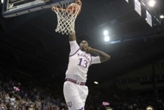 Dec 1, 2015; Lawrence, KS, USA; Kansas Jayhawks forward Cheick Diallo (13) dunks the ball against the Loyola-Maryland Greyhounds in the second half at Allen Fieldhouse. Kansas won the game 94-61. Mandatory Credit: John Rieger-USA TODAY Sports