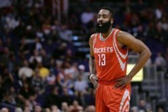 Feb 4, 2016; Phoenix, AZ, USA;  Houston Rockets guard James Harden (13) watches on during the game against the Phoenix Suns at Talking Stick Resort Arena. Mandatory Credit: Jennifer Stewart-USA TODAY Sports
