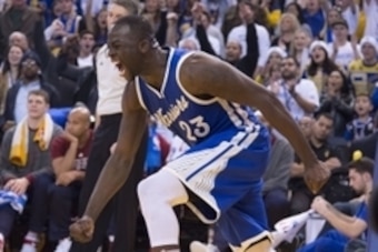 December 25, 2015; Oakland, CA, USA; Golden State Warriors forward Draymond Green (23) celebrates in the fourth quarter of a NBA basketball game on Christmas against the Cleveland Cavaliers at Oracle Arena. The Warriors defeated the Cavaliers 89-83.  Mand
