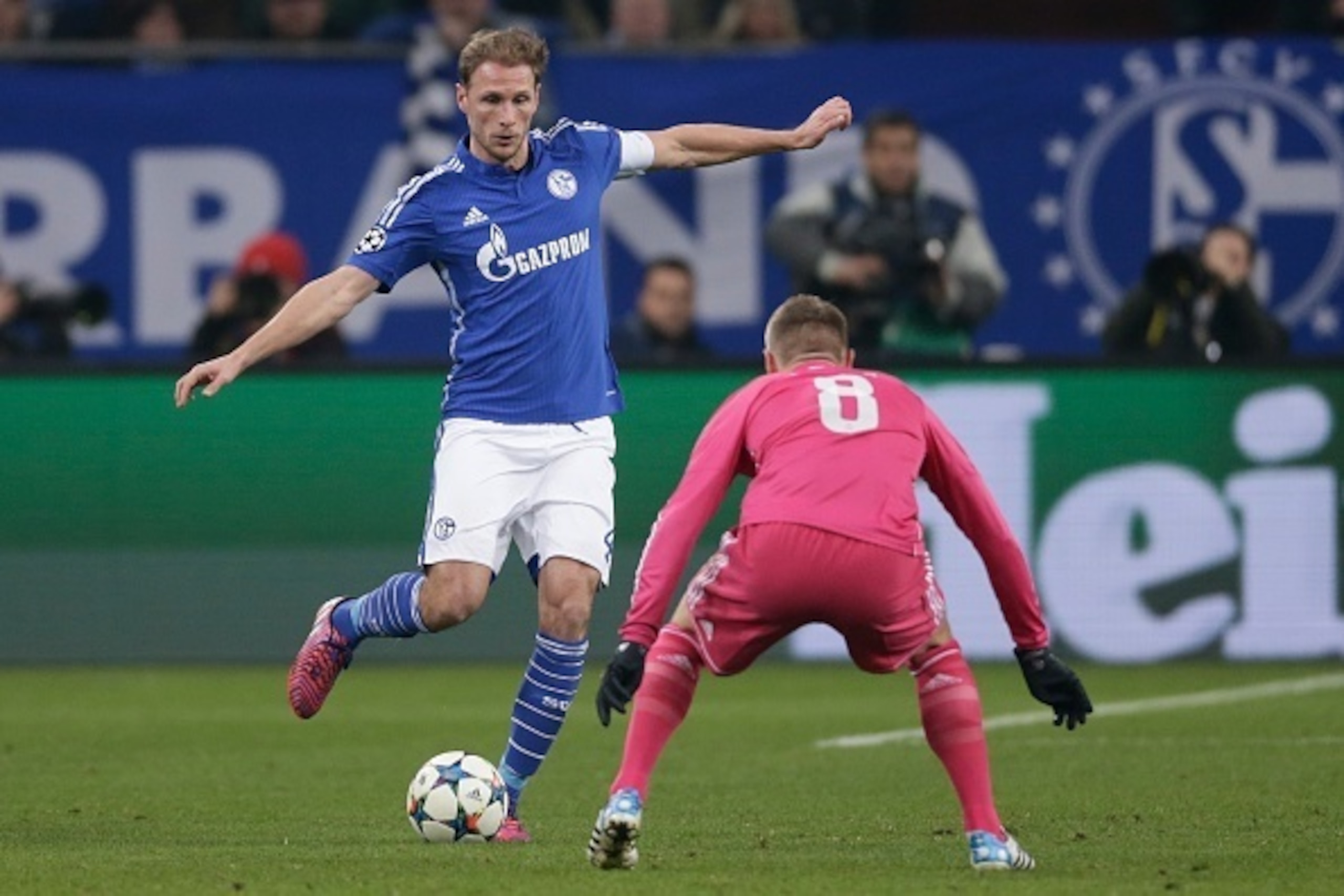 (L-R) Benedikt Howedes of Schalke 04, Toni Kroos of Real Madrid during the round of 16 UEFA Champions League match between Schalke 04 and Real Madrid on February 18, 2015 at the Veltins Arena in Gelsenkirchen, Germany.(Photo by VI Images via Getty Images)