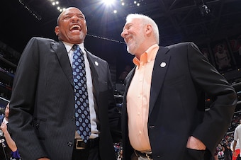 LOS ANGELES, CA - NOVEMBER 10: Head coach Doc Rivers of the Los Angeles Clippers and head coach Gregg Popovich of the San Antonio Spurs have a laugh before the game on November 10, 2014 at STAPLES CENTER in Los Angeles, California. NOTE TO USER: User expr
