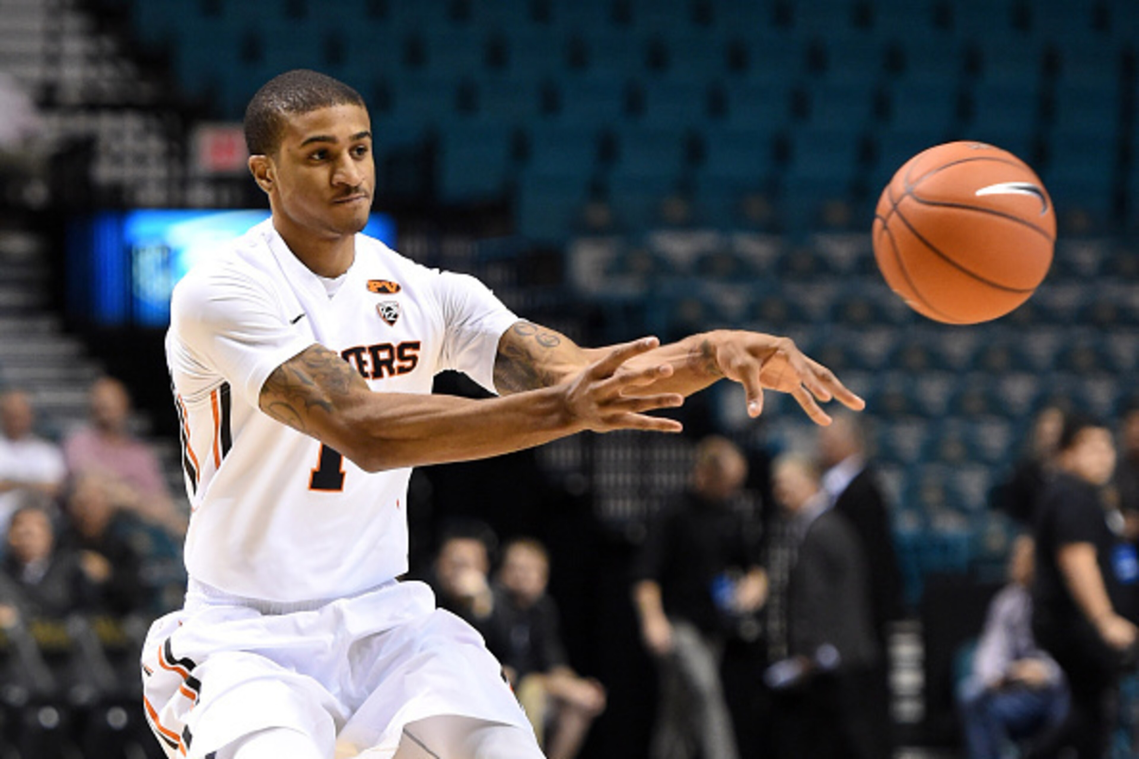 LAS VEGAS, NV - NOVEMBER 26: Gary Payton II #1 of the Oregon State Beavers passes against the Auburn Tigers during the 2014 MGM Grand Main Event basketball tournament at the MGM Grand Garden Arena on November 26, 2014 in Las Vegas, Nevada. Auburn won 71- LAS VEGAS, NV - NOVEMBER 26: Gary Payton II #1 of the Oregon State Beavers passes against the Auburn Tigers during the 2014 MGM Grand Main Event basketball tournament at the MGM Grand Garden Arena on November 26, 2014 in Las Vegas, Nevada. Auburn won 71-