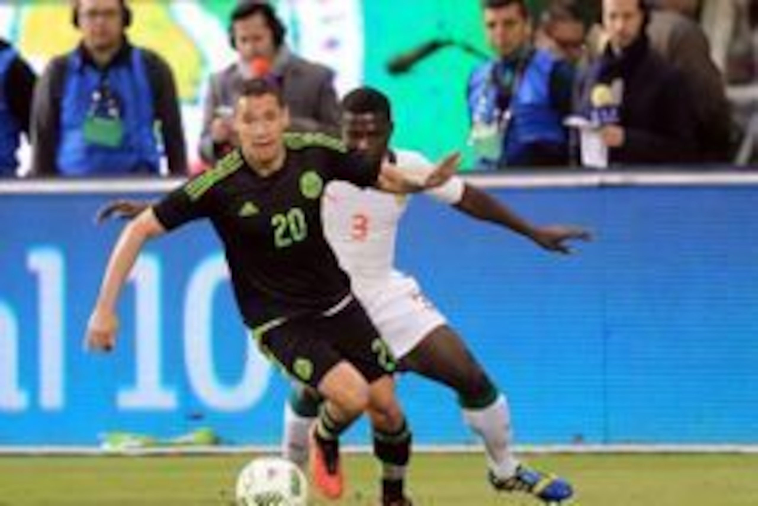 Feb 10, 2016; Miami, FL, USA; Mexico midfielder Jesus Duenas (20) controls the ball from Senegal midfielder Nestor Pamipi Mendy (3) during a soccer friendly at Marlins Park. Mexico won 2-0. Mandatory Credit: Steve Mitchell-USA TODAY Sports Feb 10, 2016; Miami, FL, USA; Mexico midfielder Jesus Duenas (20) controls the ball from Senegal midfielder Nestor Pamipi Mendy (3) during a soccer friendly at Marlins Park. Mexico won 2-0. Mandatory Credit: Steve Mitchell-USA TODAY Sports