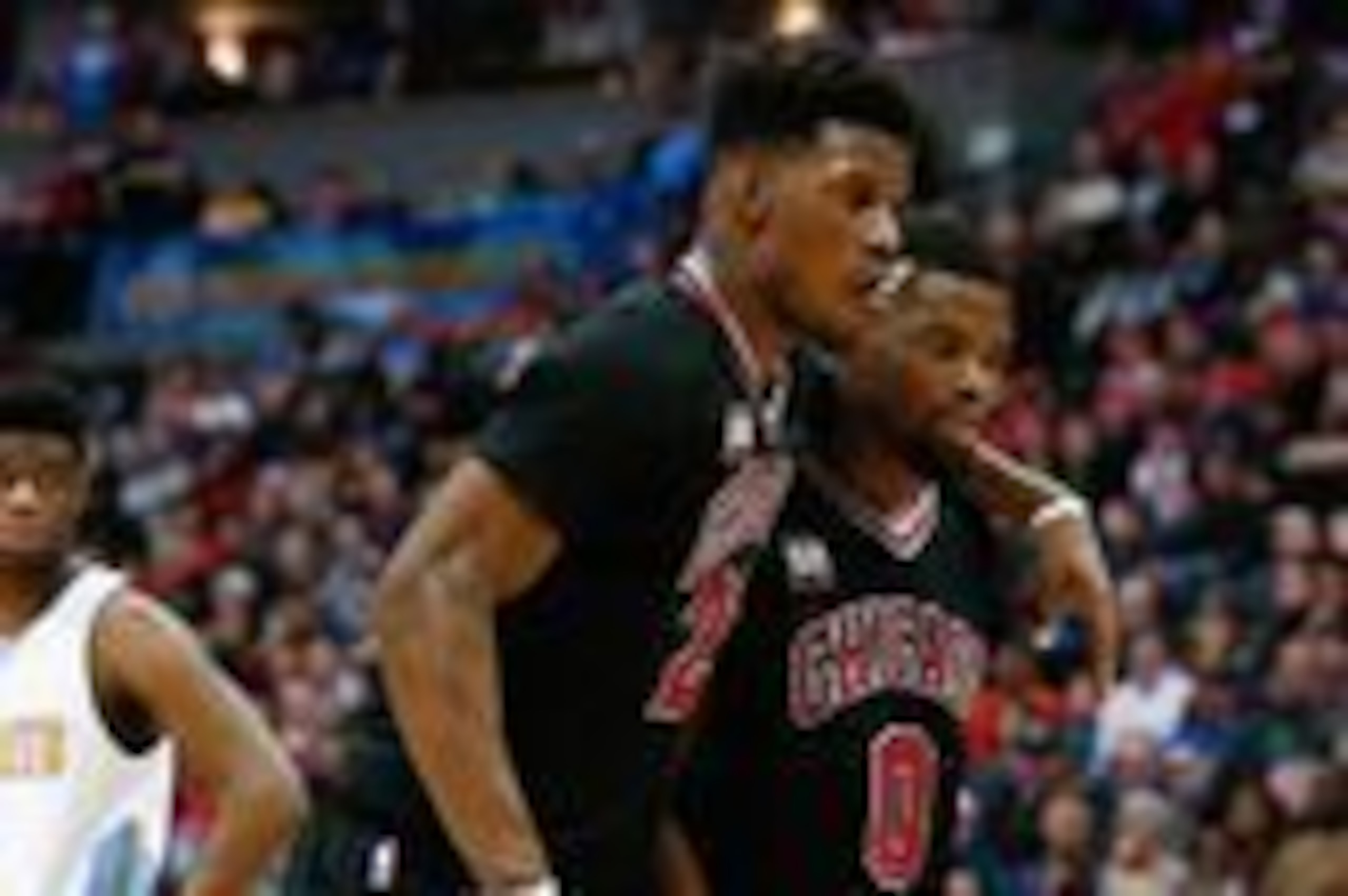 Feb 5, 2016; Denver, CO, USA; Chicago Bulls guard Aaron Brooks (0) helps guard Jimmy Butler (21) off the court in the second quarter against the Denver Nuggets at the Pepsi Center. Mandatory Credit: Isaiah J. Downing-USA TODAY Sports Feb 5, 2016; Denver, CO, USA; Chicago Bulls guard Aaron Brooks (0) helps guard Jimmy Butler (21) off the court in the second quarter against the Denver Nuggets at the Pepsi Center. Mandatory Credit: Isaiah J. Downing-USA TODAY Sports